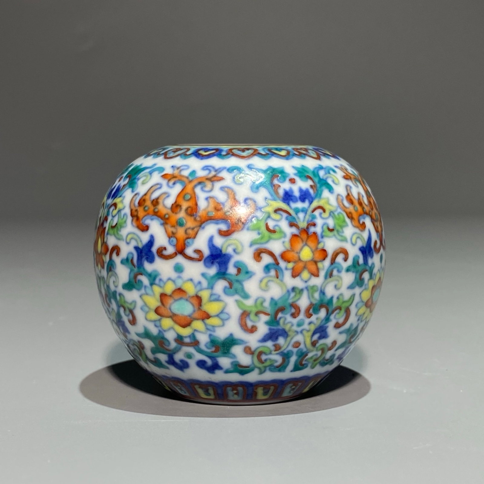 An Exquisite Doucai Lotus Pattern Water Pot: An Exquisite Doucai Lotus Pattern Water Pot,Qing Dynasty,China,Qianlong Six-character Mark,Size:2.4inx2.8in 斗彩缠枝莲纹水盂,中国清