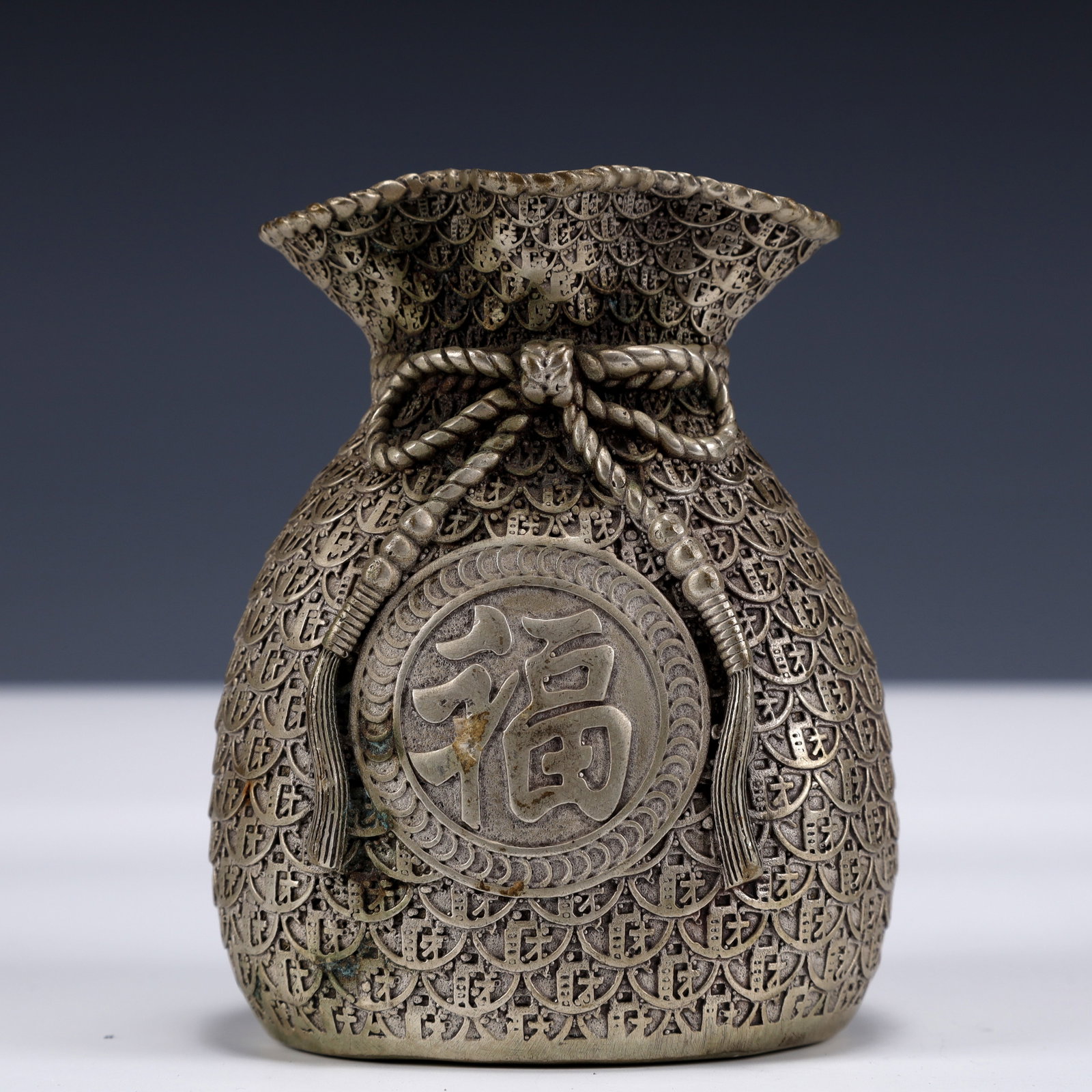 An Exquisite Silver-Plated Bronze Fu-Character Pattern Vase: An Exquisite Silver-Plated Bronze Fu-Character Pattern Vase,Qing Dynasty, China,Qianlong Four-character Mark,Size:3.1inx2.8inx4.3in,Weight:450g 铜镀银福字纹瓶