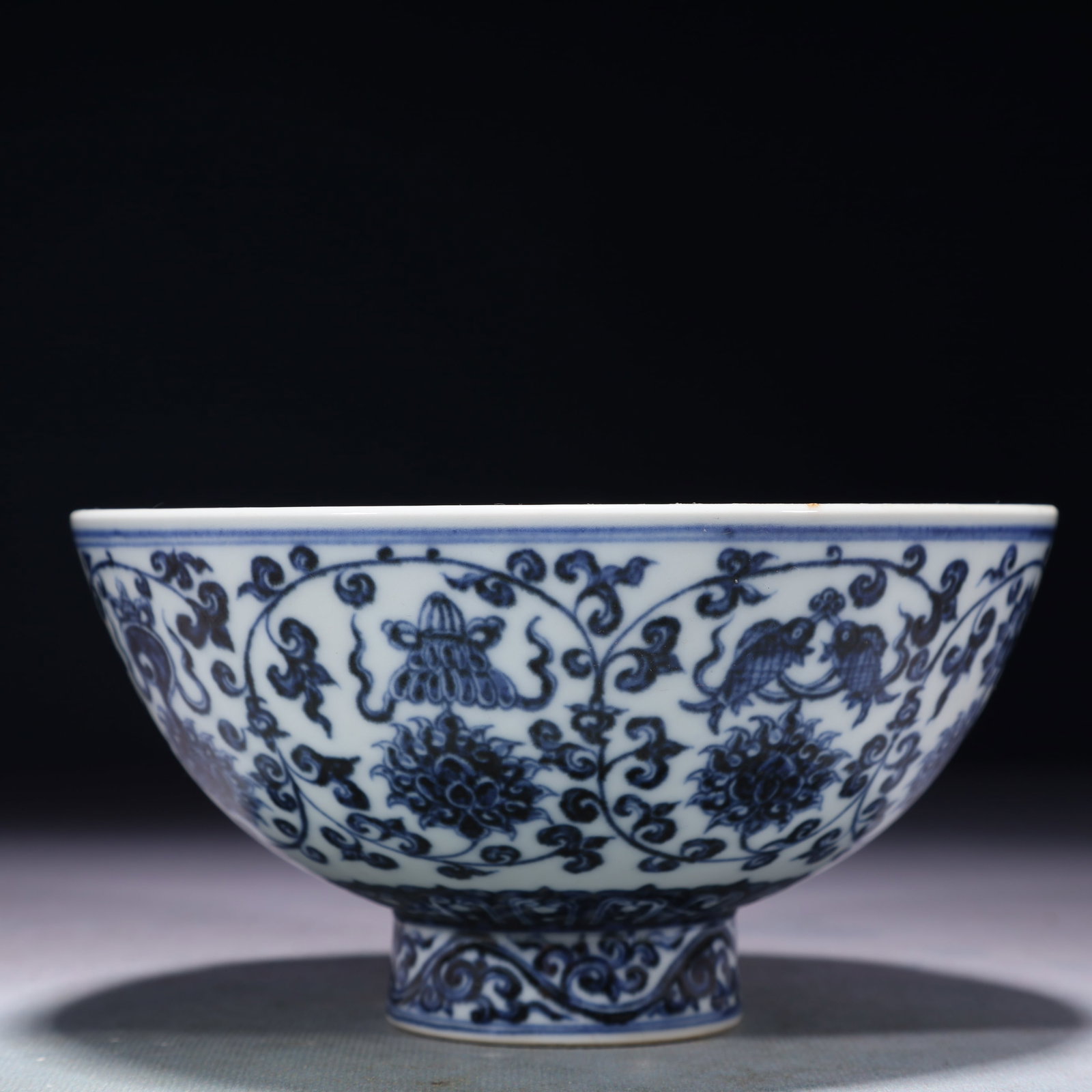 An Exquisite Blue and White Lotus Pattern Bowl: An Exquisite Blue and White Lotus Pattern Bowl,Ming Dynasty,China,Xuande Six-character Mark,Size:6.3inx3.1in,Weight:400g 青花缠枝莲纹碗,中国਴