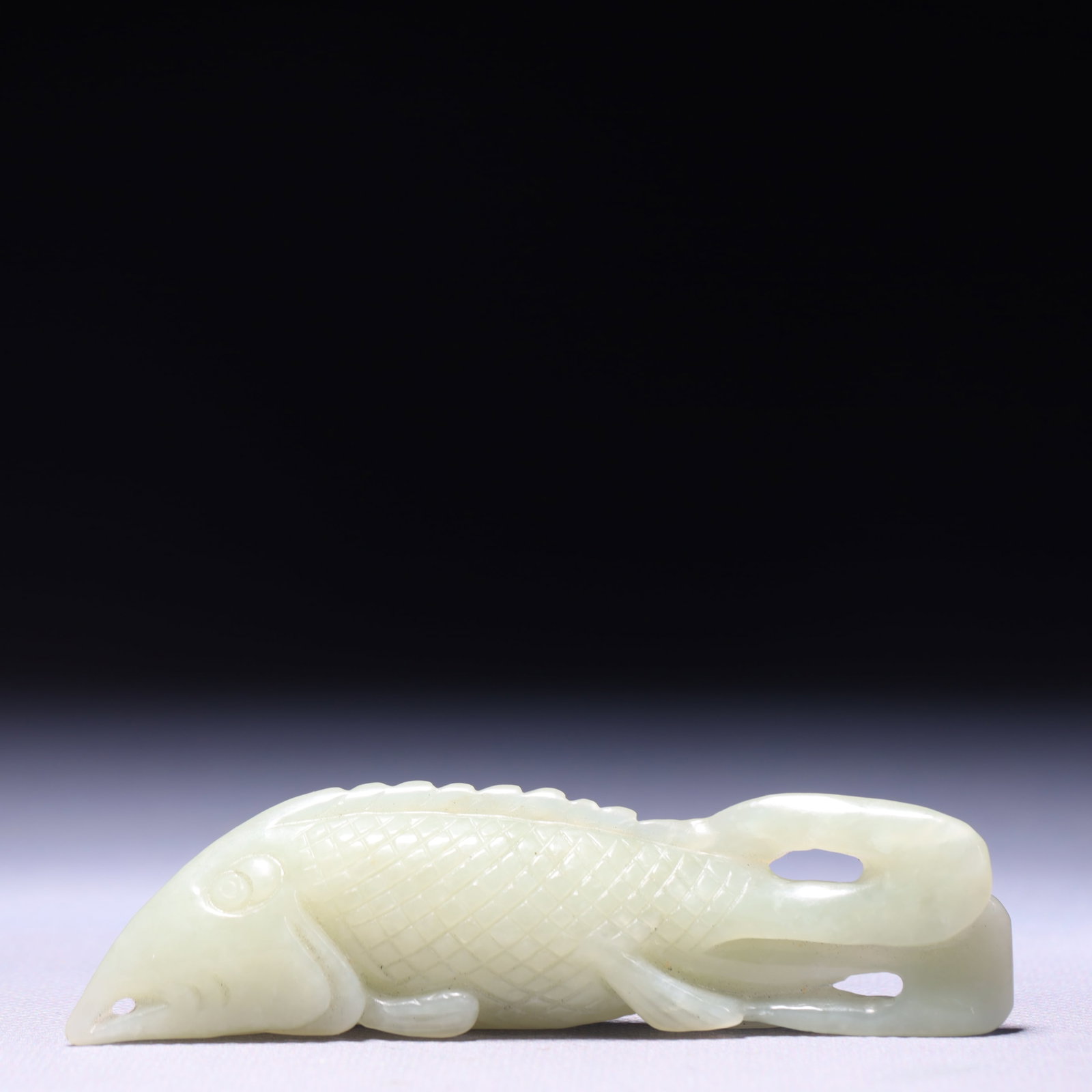 An Exquisite White Jade Fish Ornament: An Exquisite White Jade Fish Ornament,Qing Dynasty,China,Size:4.1inx0.6inx1in,Weight:58g 白玉鱼摆件,中国清代