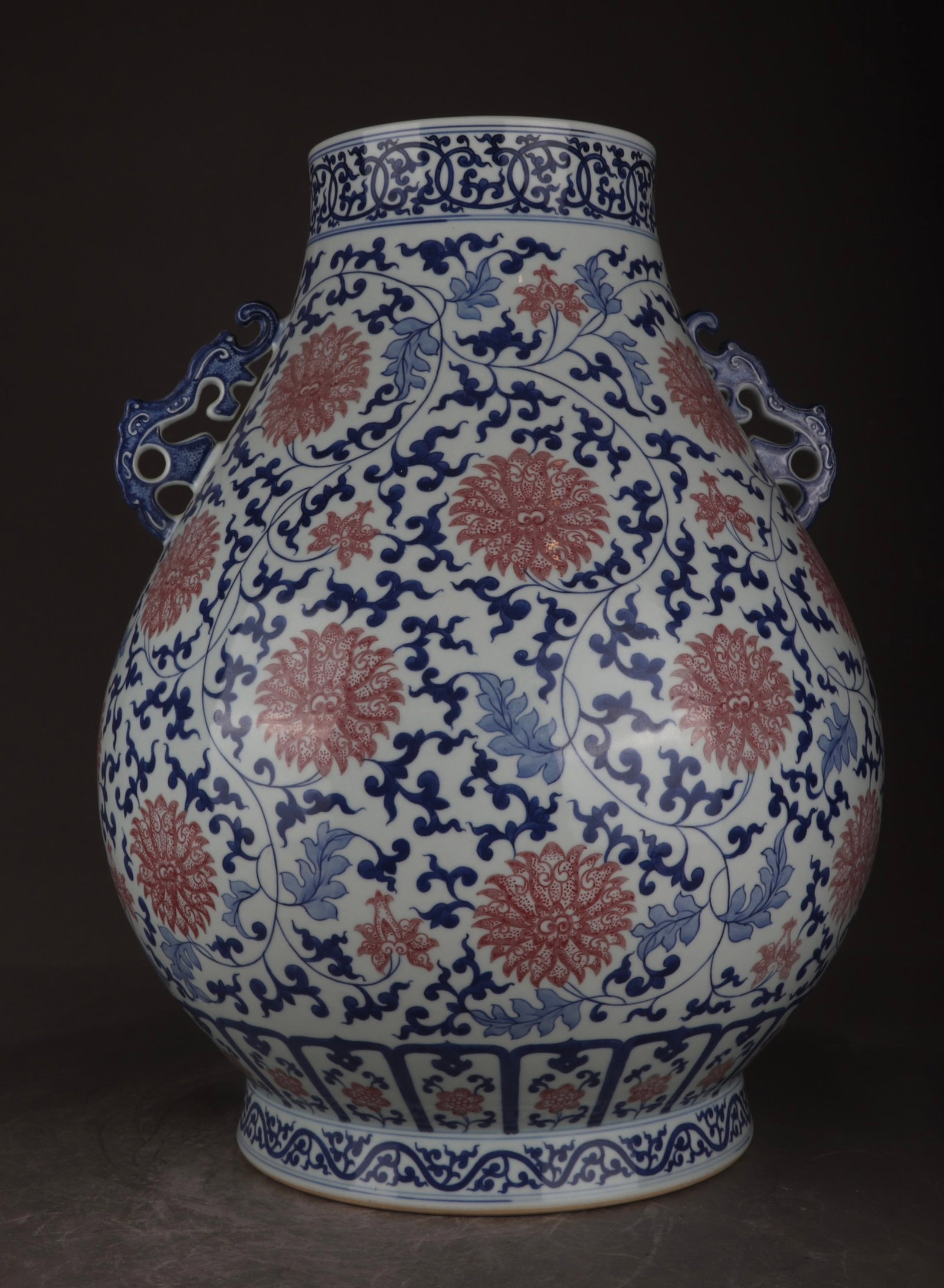 A Huge Blue and White Underglaze-Red Lotus Pattern Double-Ears Vase: A Huge Blue and White Underglaze-Red Lotus Pattern Double-Ears Vase,Qing Dynasty,China,Qianlong Six-character Mark,Size:18.3inx14.2in