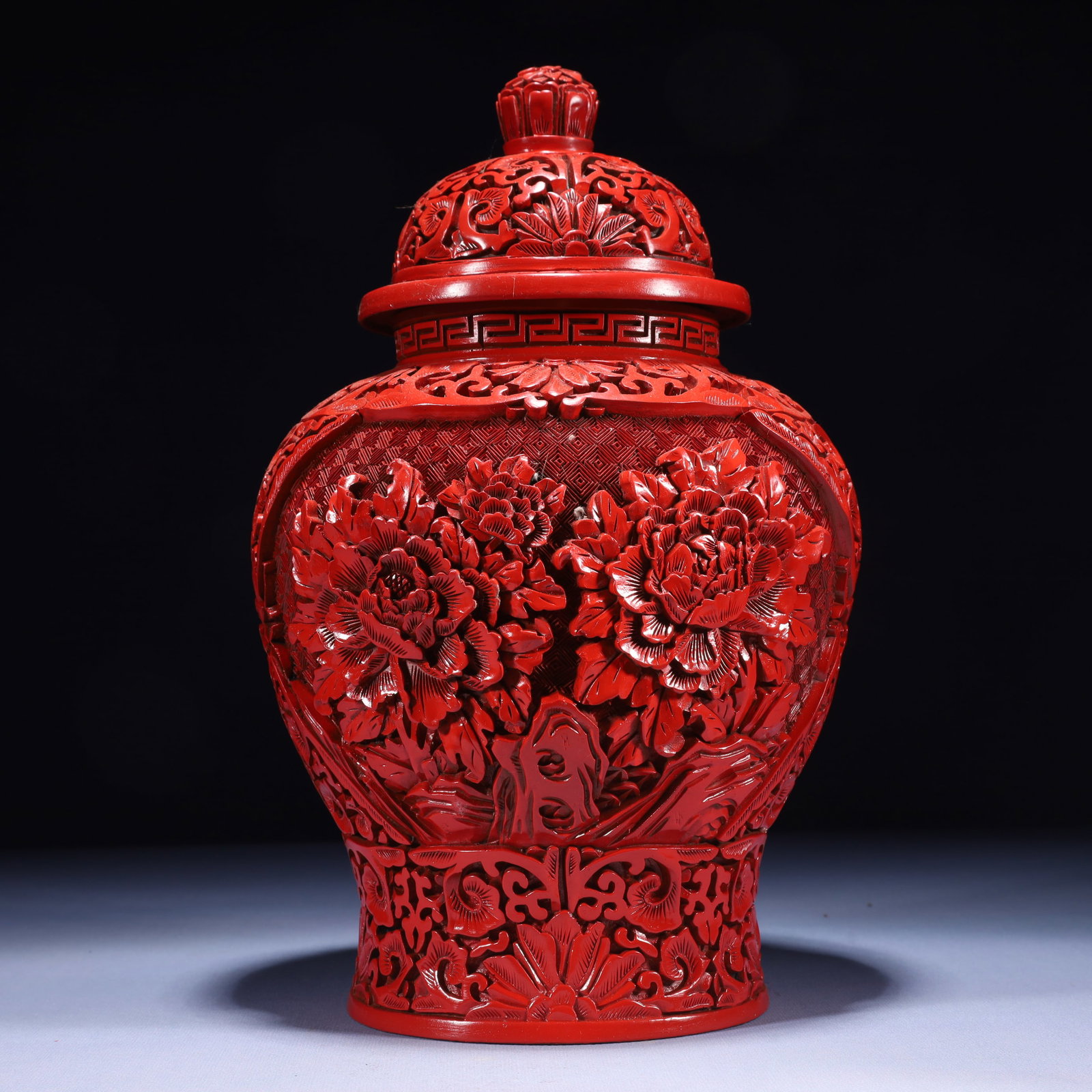 An Exquisite Carved Red Lacquer Flower Pattern Jar with Cover (1 of 11)