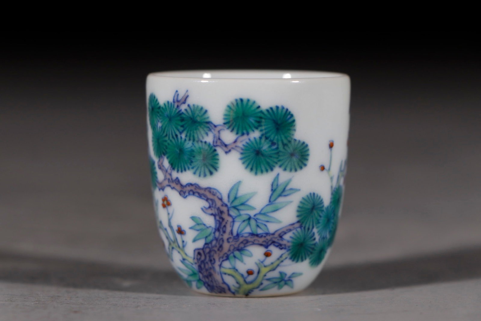 An Exquisite Doucai Pine,Bamboo and Plum Blossom Pattern Cup: An Exquisite Doucai Pine,Bamboo and Plum Blossom Pattern Cup,Qing Dynasty,China,With Mark,Size:1.5inx1.5in 斗彩松竹梅纹杯子,中国清