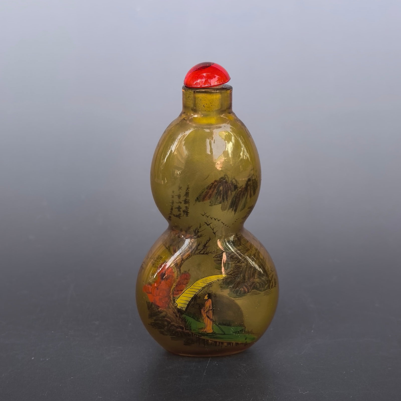 An Exquisite Glass Landscape and Figure Pattern Snuff Bottle: An Exquisite Glass Landscape and Figure Pattern Snuff Bottle,Qing Dynasty,China,Size:2inx1.2inx3.9in,Weight:64g