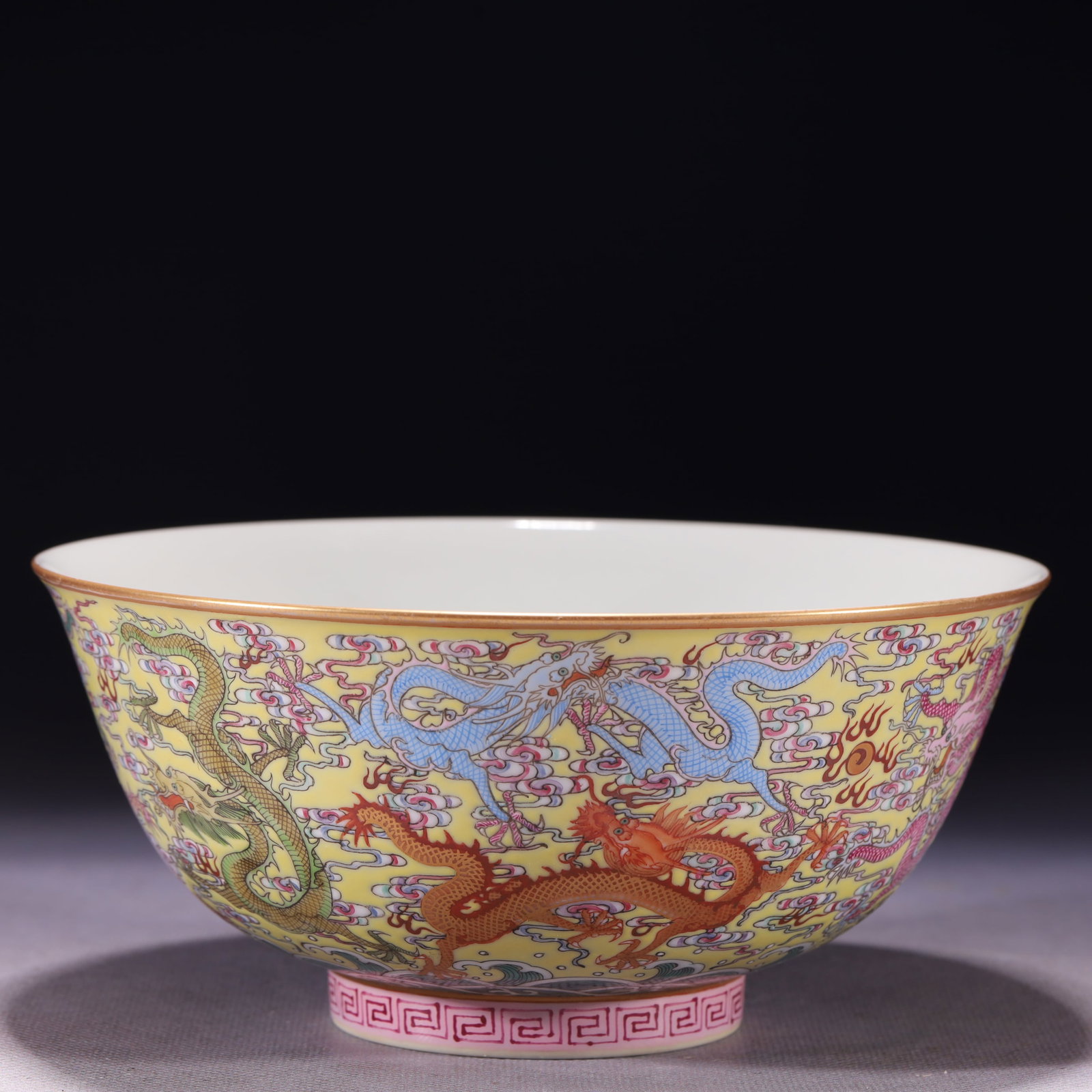 An Exquisite Yellow Ground Famille-Rose Painted Gold Auspicious Cloud and Dragon Pattern Bowl: An Exquisite Yellow Ground Famille-Rose Painted Gold Auspicious Cloud and Dragon Pattern Bowl,Qing Dynasty,China,Yongzheng Six-character Mark,Size:6.7inx3.1in,Weight:300g 黄地粉ô