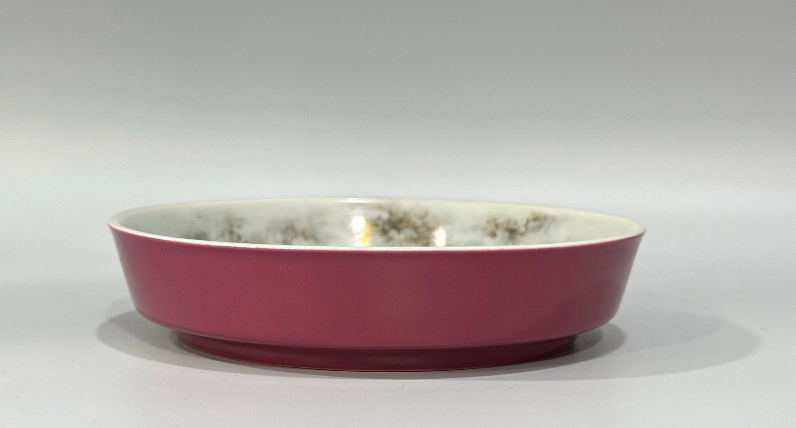 An Exquisite Enamel Ruby Red-Glazed Auspicious Cloud and Dragon Pattern Plate: An Exquisite Enamel Ruby Red-Glazed Auspicious Cloud and Dragon Pattern Plate,Qing Dynasty,China,Yongzheng Four-character Mark,Size:1.3inx5.8in