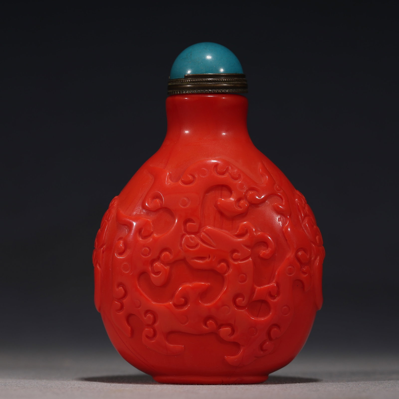 An Exquisite Coral Red Glass Three Abundances Longevity Character Pattern Snuff Bottle: An Exquisite Coral Red Glass Three Abundances Longevity Character Pattern Snuff Bottle,Qing Dynasty,China,Yongzheng Four-character Mark,Size:1.8in×1.8in×3.5in 珊瑚红琉