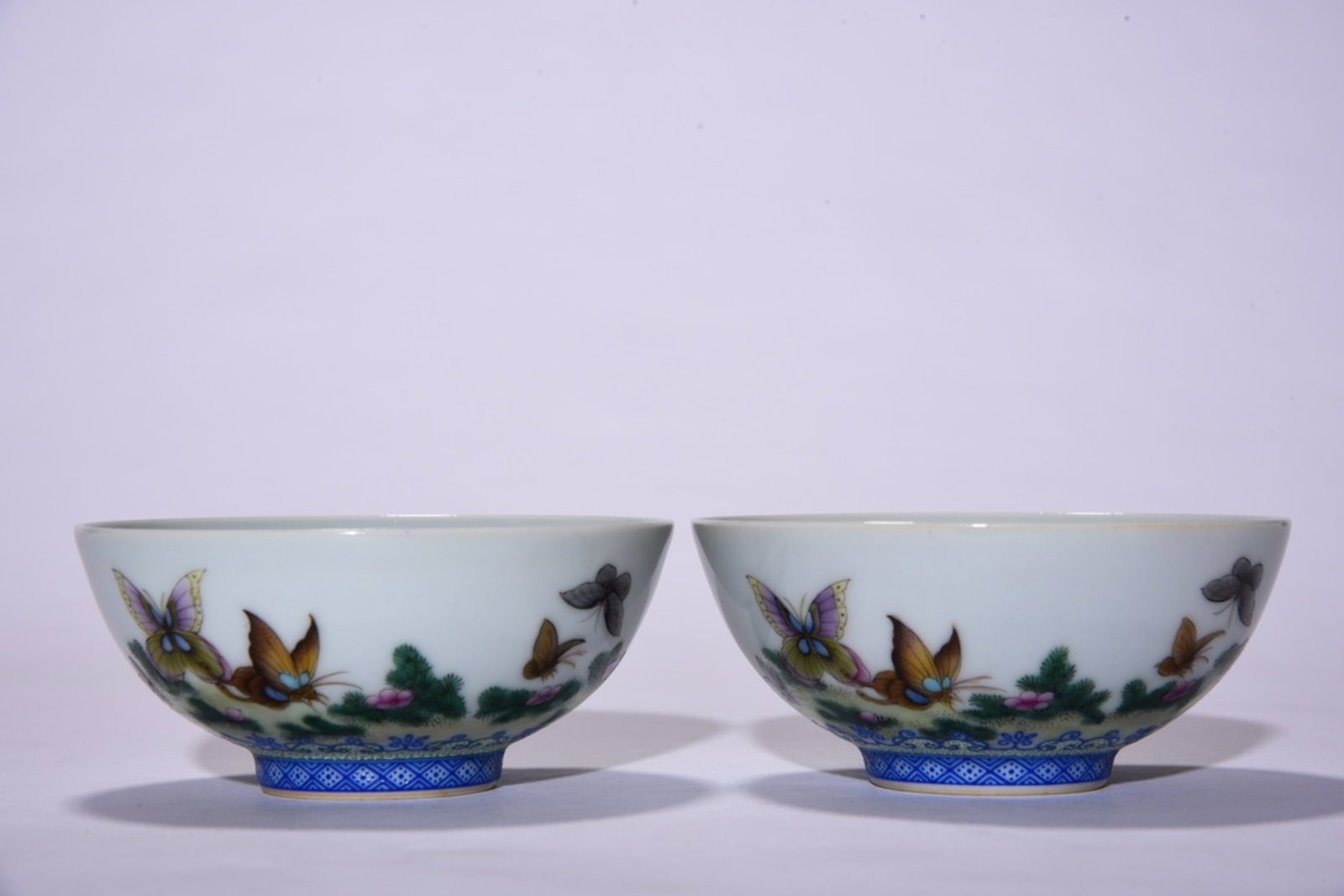 A Pair of Exquisite Famille-Rose Flower and Butterfly Pattern Cups,with poem: A Pair of Exquisite Famille-Rose Flower and Butterfly Pattern Cups,with poem,Qing Dynasty,China,Yongzheng Six-character Mark,Size:1.8inx4in 一对粉彩花卉蝴"