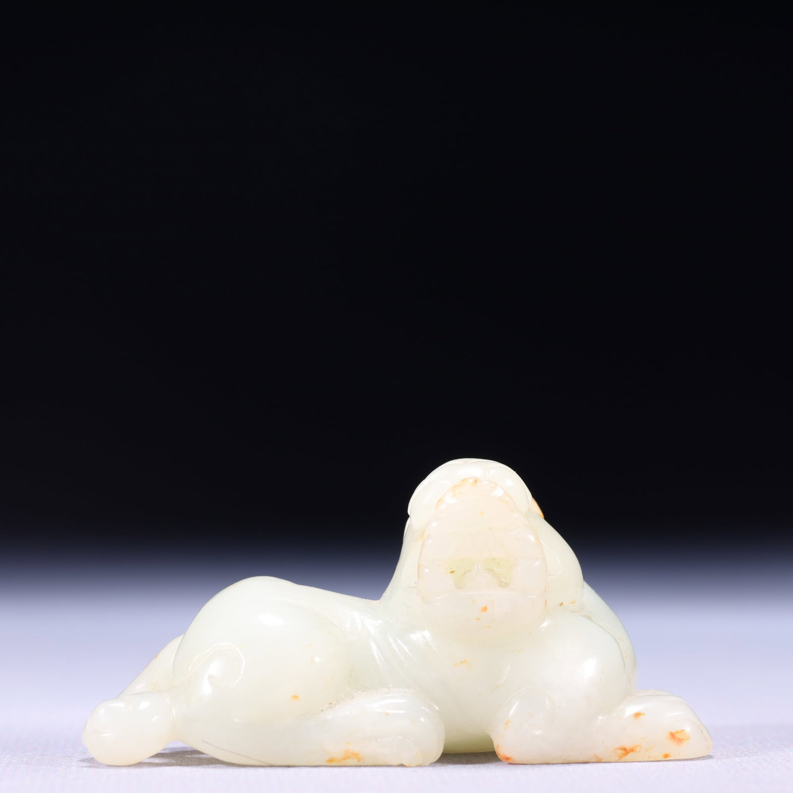 An Exquisite White Jade Lion Ornament: An Exquisite White Jade Lion Ornament,Qing Dynasty,China,Size:2.6inx1.2inx1.3in,Weight:74g 白玉狮子摆件,中国清代