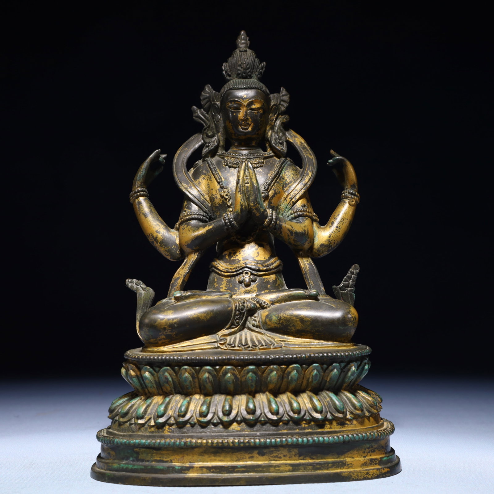 A Solemn Gilt Bronze Statue of Four-Arms Avalokitesvara: A Solemn Gilt Bronze Statue of Four-Arms Avalokitesvara,Qing Dynasty,China,Size:5.7inx3.7inx8.9in,Weight:2150g