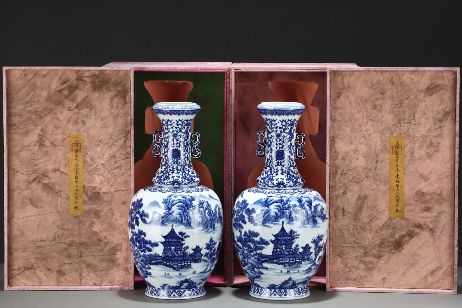A Pair of Exquisite Blue and White Landscape Pattern Double-Ears Vase: A Pair of Exquisite Blue and White Landscape Pattern Double-Ears Vase,Qing Dynasty,China,with Qianlong Six-character Mark,Size:15.9inx7.9in s一对青花山水纹