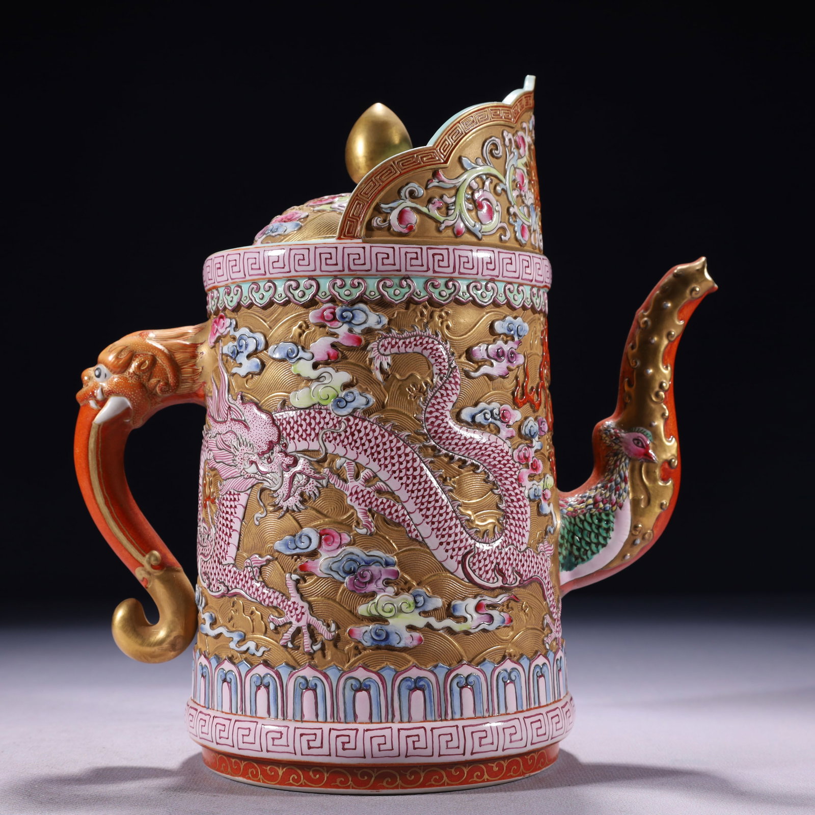 An Exquisite Gold Ground Famille-Rose Dragon and Phoenix Pattern Pot: An Exquisite Gold Ground Famille-Rose Dragon and Phoenix Pattern Pot,Qing Dynasty,China,Qianlong Six-character Mark,Size:7.9inx4.7inx8.7in,Weight:1650g 金地粉彩龙凤