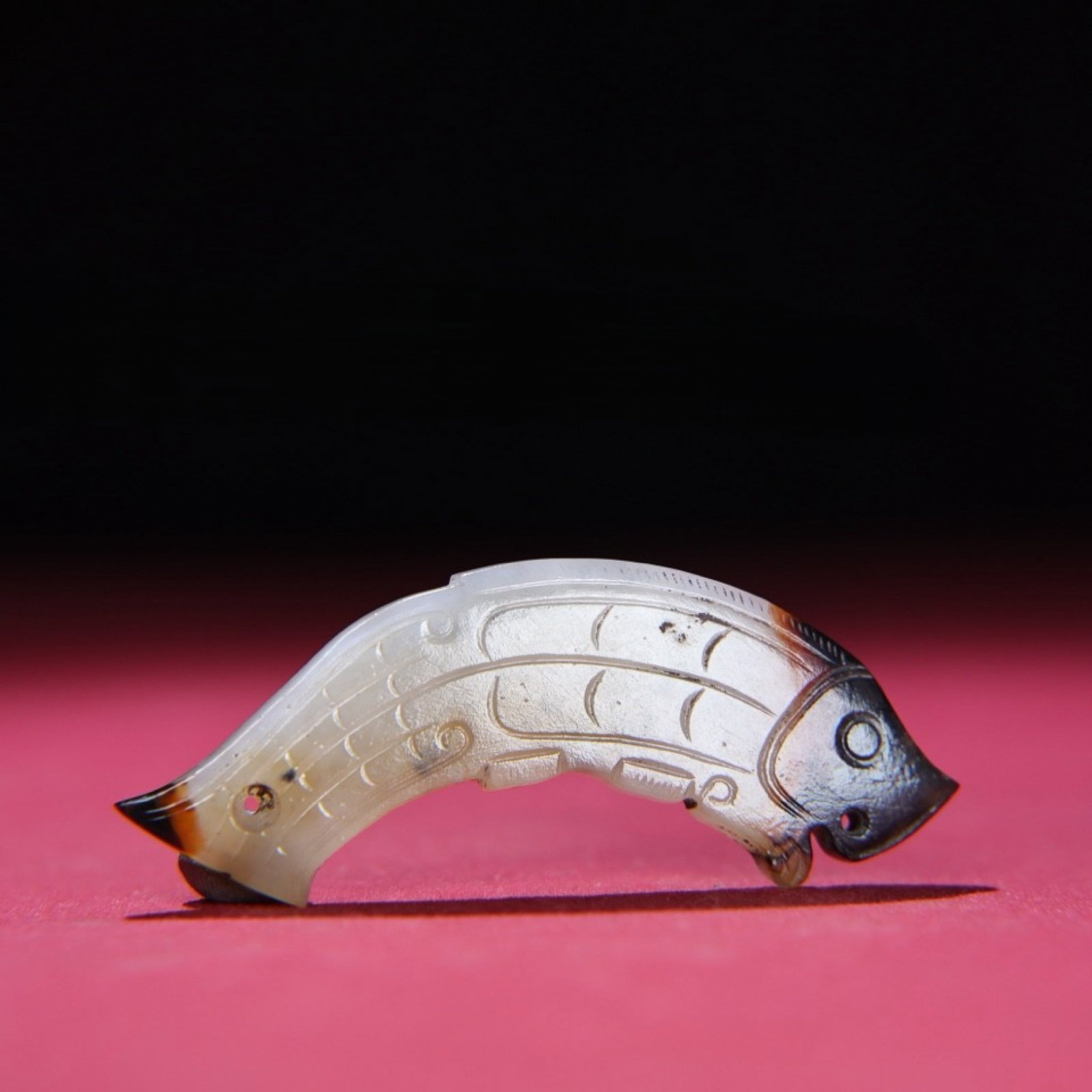 An Exquisite White Jade Fish Ornament: An Exquisite White Jade Fish Ornament,Qing Dynasty,China,Size:82mmx33mmx5mm,Weight:21g 白玉鱼摆件,中国清代