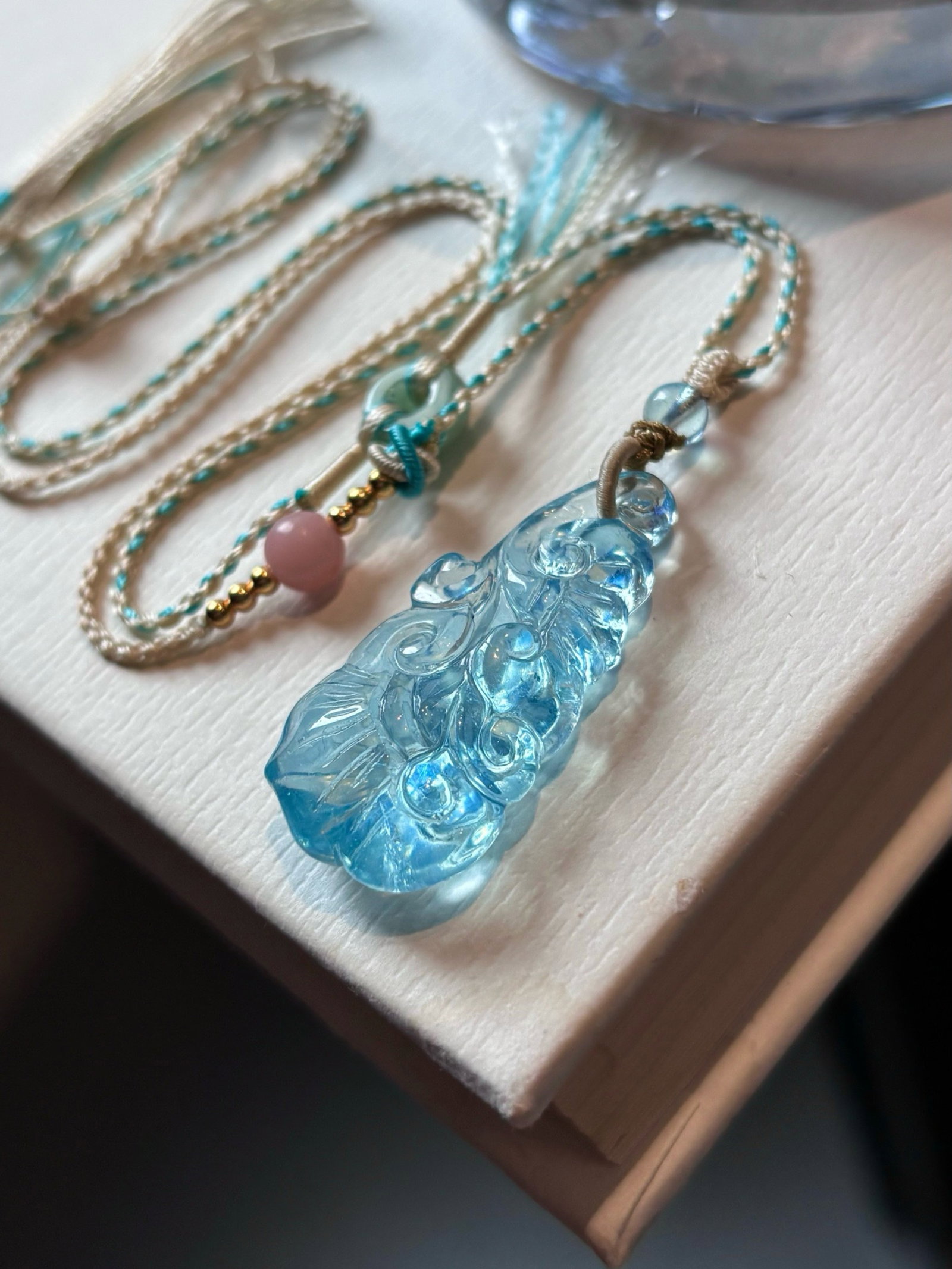 An Exquisite Aquamarine Ruyi Necklace: An Exquisite Aquamarine Ruyi Necklace,Size:33mmx16mm,Weight:5.9g 海蓝宝如意项链