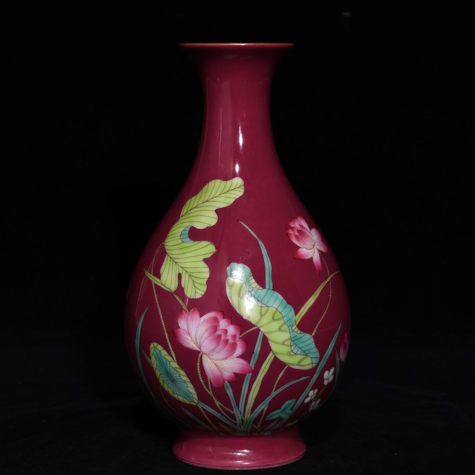 An Exquisite Ruby Red-Glazed Famille-Rose Lotus Pattern Vase: An Exquisite Ruby Red-Glazed Famille-Rose Lotus Pattern Vase,Qing Dynasty,China,Yongzheng Four-character Mark,Size:6.5inx3.7in