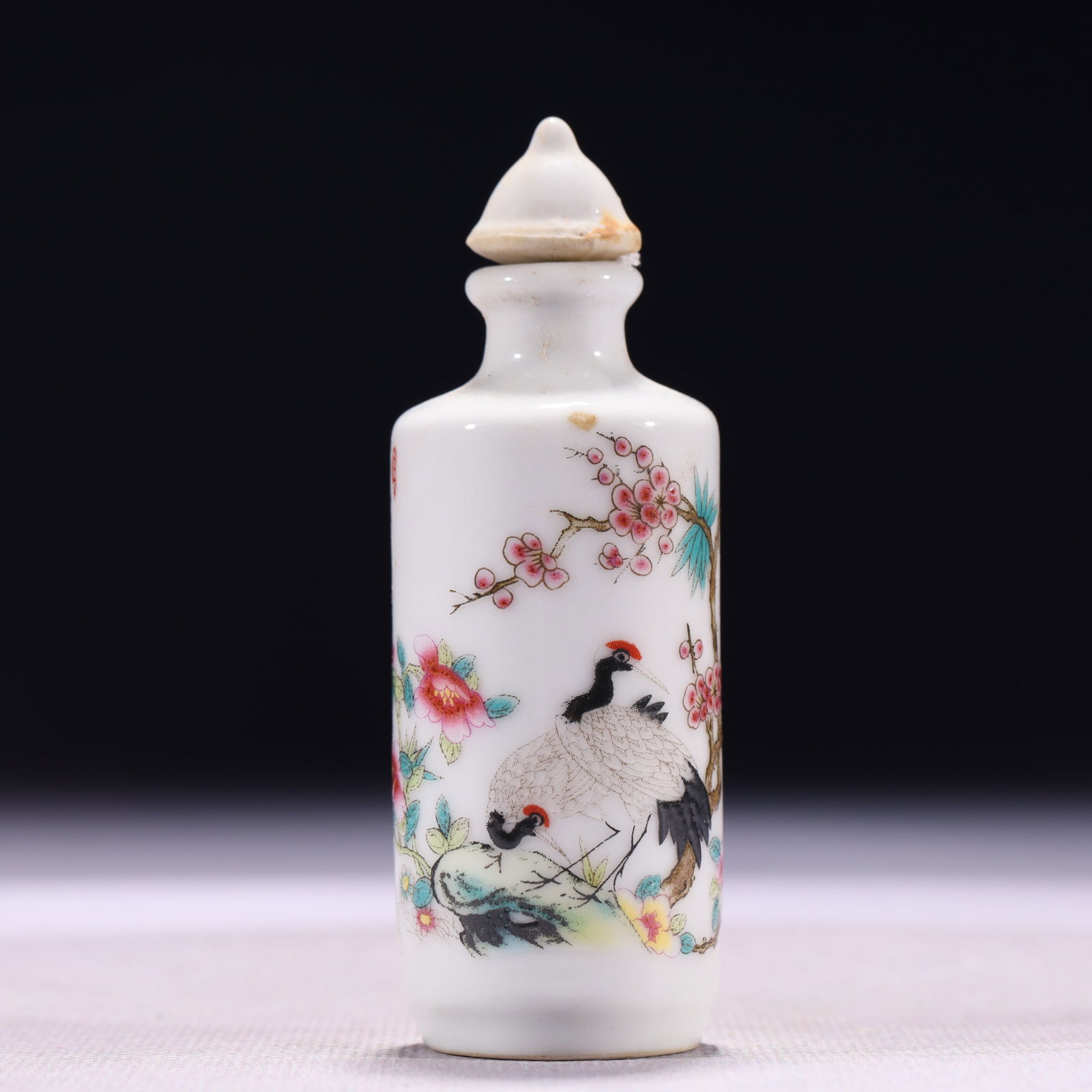 An Exquisite Famille-Rose Flower and Crane Pattern Snuff Bottle: An Exquisite Famille-Rose Flower and Crane Pattern Snuff Bottle,Qing Dynasty,China,Qianlong Four-character Mark,Size:1.2inx3.5in,Weight:58g 粉彩花卉鹤纹鼻