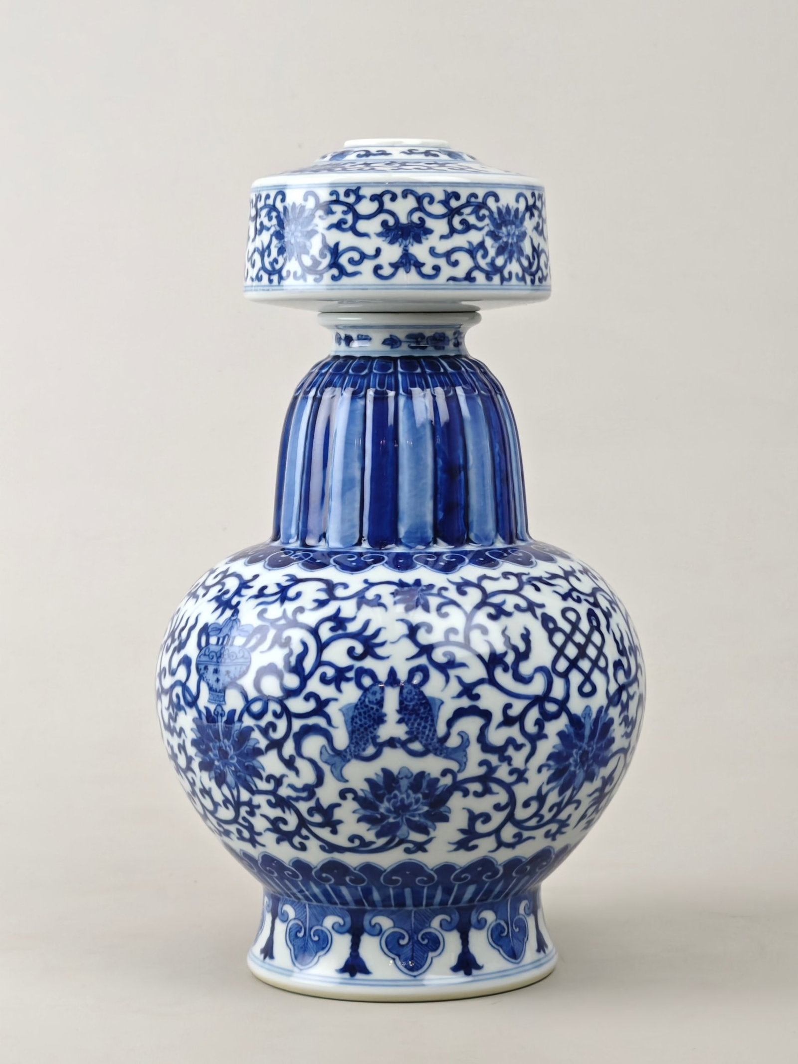 An Exquisite Blue and White Lotus Pattern Vase: An Exquisite Blue and White Lotus Pattern Vase,Qing Dynasty,China,Qianlong Six-character Mark,Size:11.4inx6.9in 青花缠枝莲纹瓶,中国清代