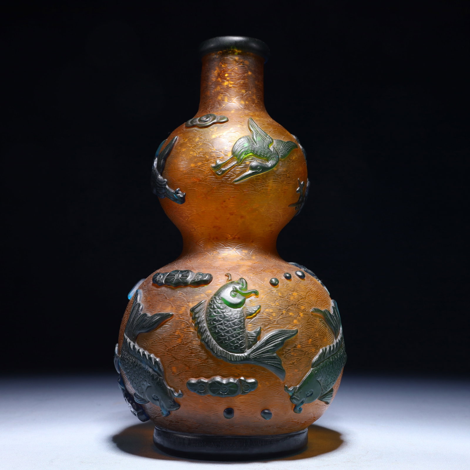 An Exquisite Glass Flower and Fish Pattern Gourd-Shaped Vase: An Exquisite Glass Flower and Fish Pattern Gourd-Shaped Vase,Qing Dynasty,China,Qianlong Four-character Mark,Size:5.5inx10.2in,Weight:1200g 琉璃花卉鱼纹葫!
