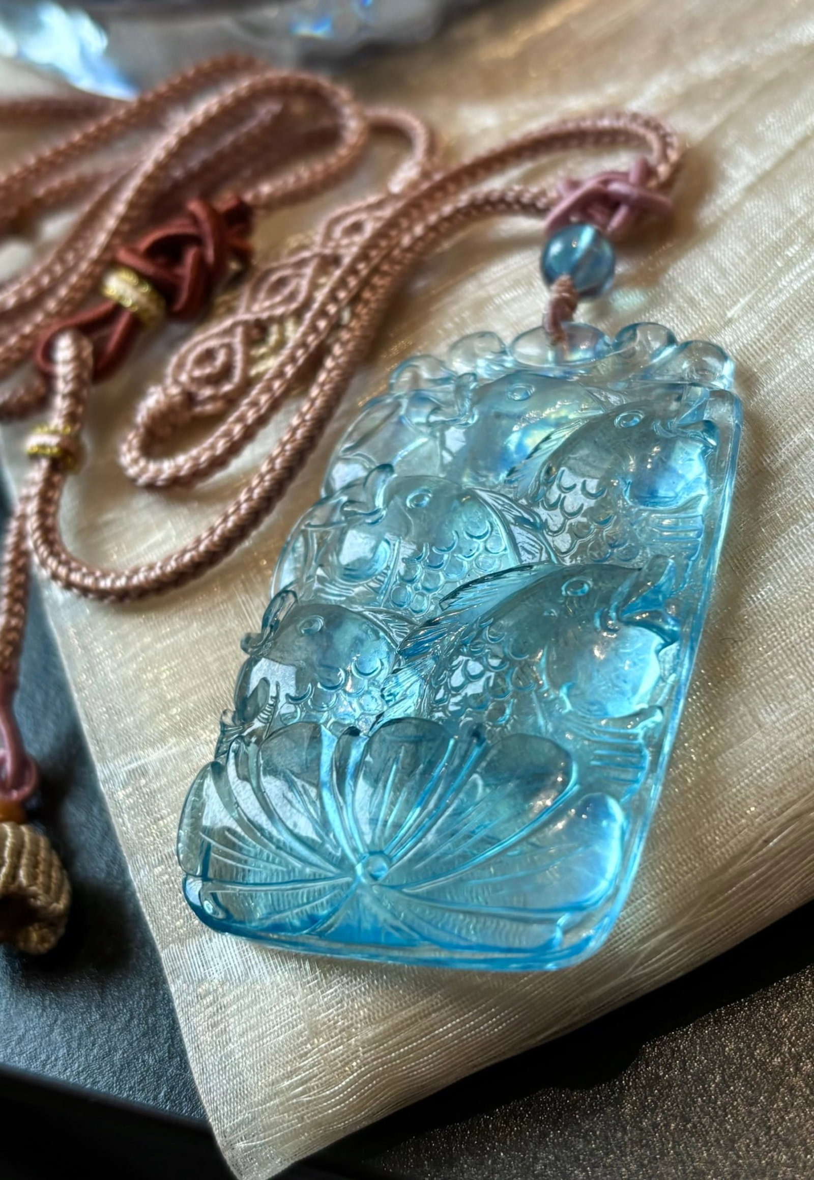 An Exquisite Aquamarine Fish Pattern Pendant: An Exquisite Aquamarine Fish Pattern Pendant,Size:52mmx34mm,Total Weight:27.4g 海蓝宝鱼纹吊坠