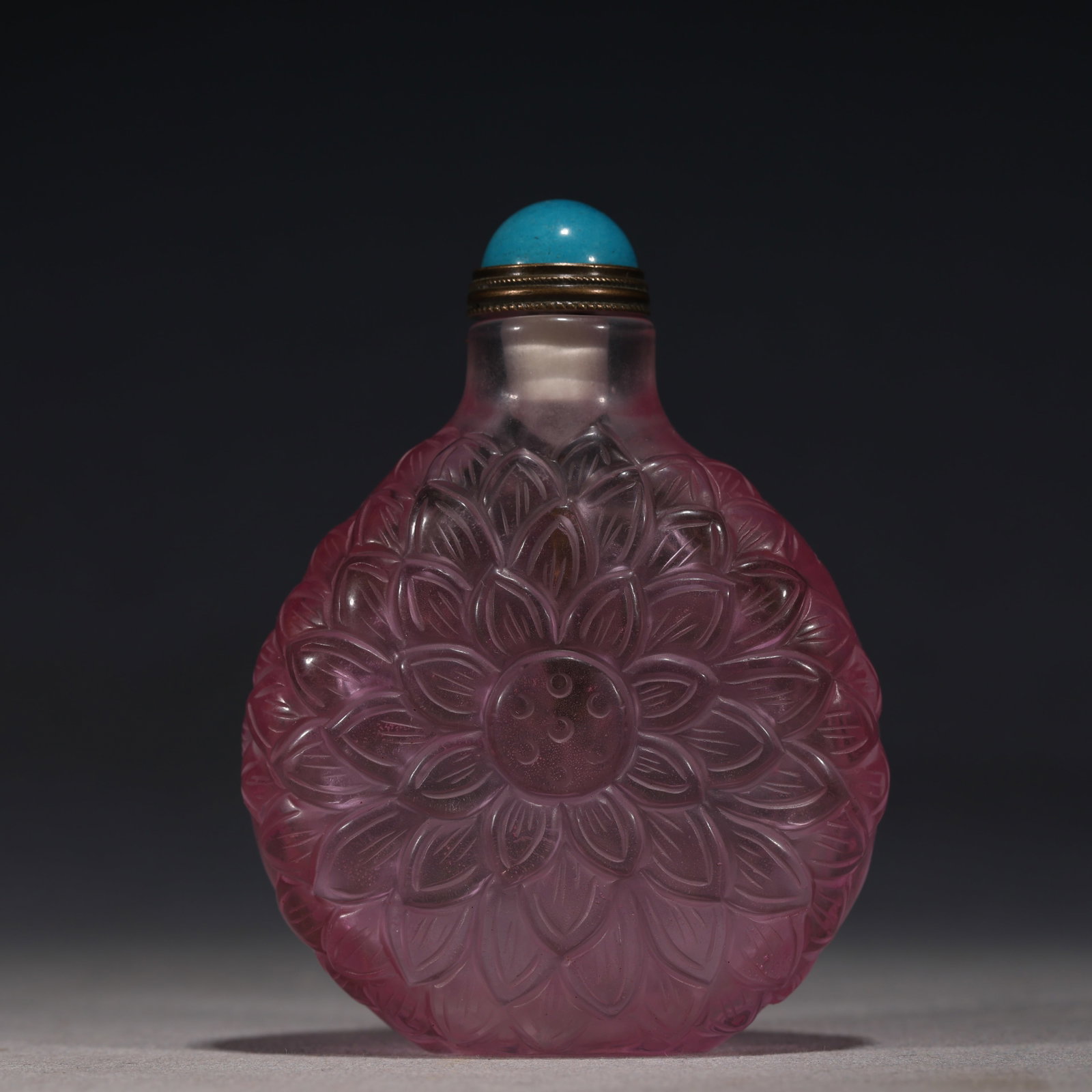An Exquisite Pink Relief Lotus Pattern Snuff Bottle: An Exquisite Pink Relief Lotus Pattern Snuff Bottle,Qing Dynasty, China,Qianlong Four-character Mark,Size:2.4in×1in×3.1in