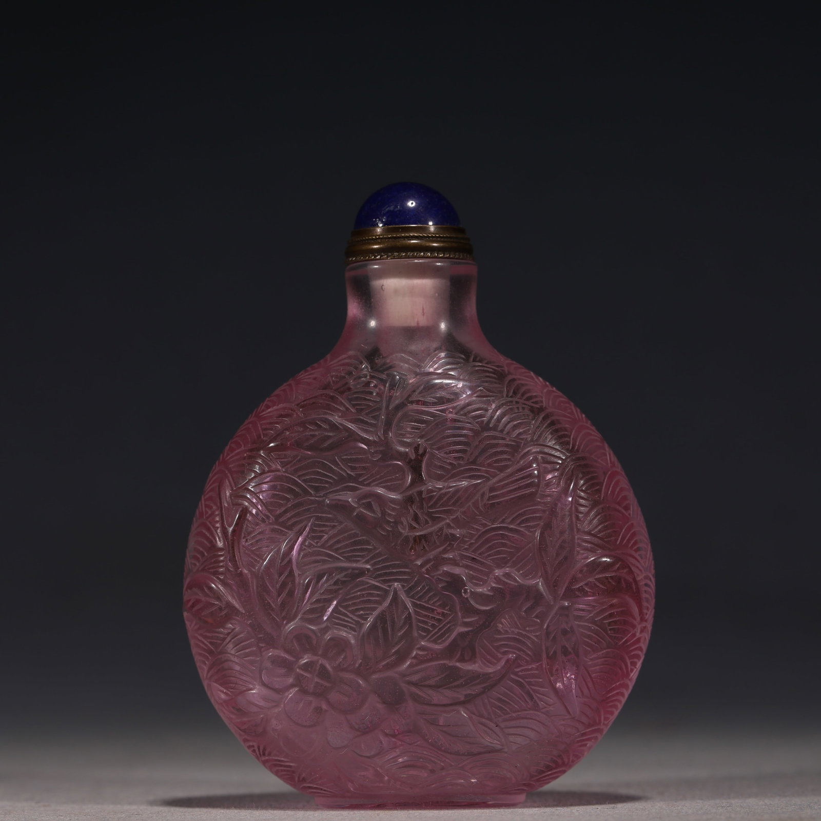An Exquisite Pink Relief Bird and Flower Pattern Snuff Bottle: An Exquisite Pink Relief Bird and Flower Pattern Snuff Bottle,Qing Dynasty, China,Qianlong Four-character Mark,Size:2.4in×1in×3.1in 粉色浮雕花鸟图&#