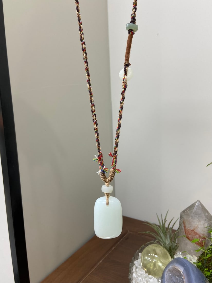 A Finely Carved Hetian Jade 'Shanliushui' 'Ping An' Plaque Pendant (1 of 6)