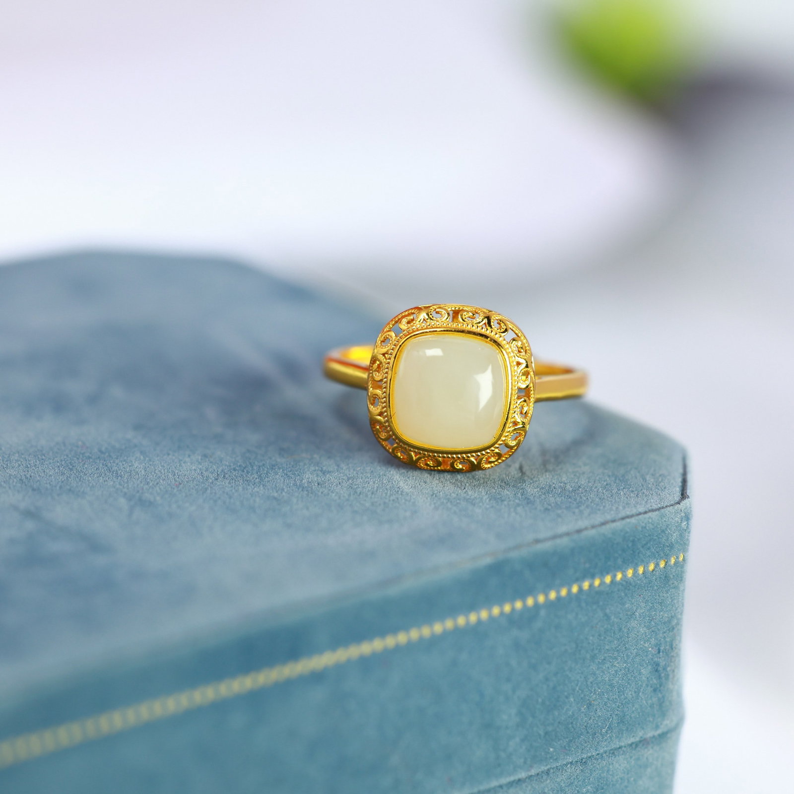 A Sterling Silver and White Jade Square Ring: A sterling silver ring set with a white jade of square form, Sise: 8mm×8 mm.