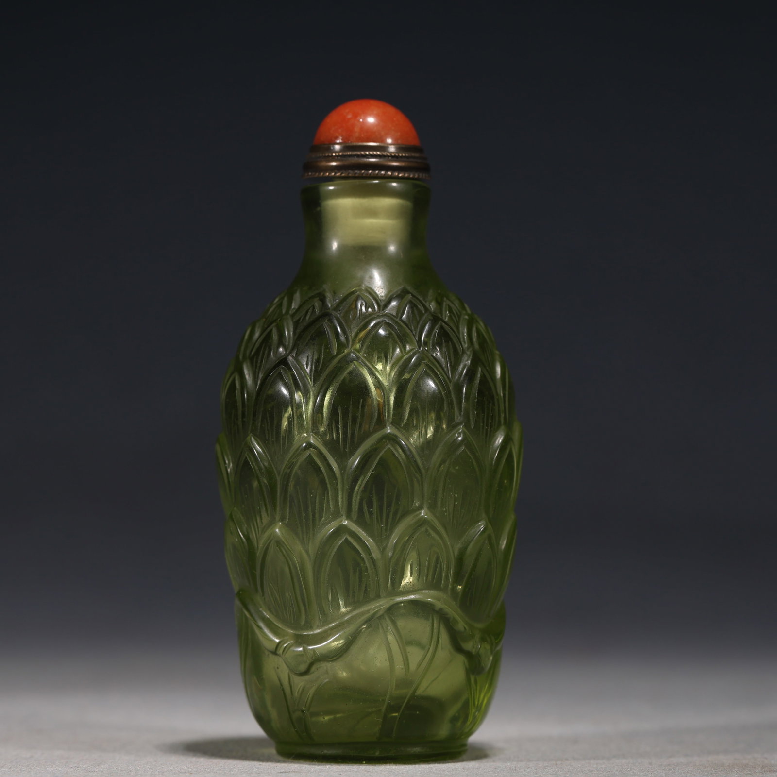 An Exquisite Green Glass Relief Lotus Petal Pattern Snuff Bottle: An Exquisite Green Glass Relief Lotus Petal Pattern Snuff Bottle,Qing Dynasty, China,Size:1.6in×1.6in×3.3in