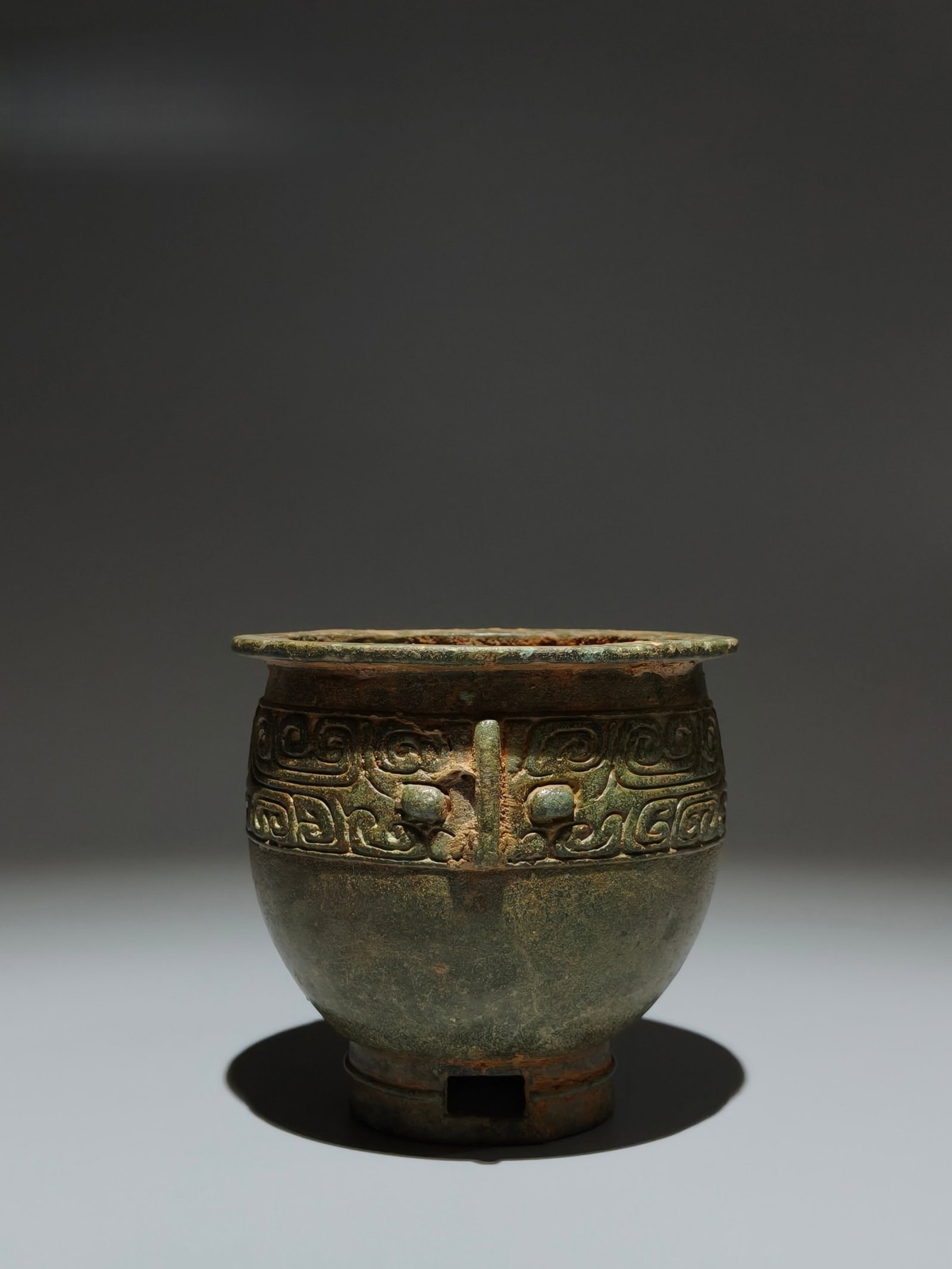 An Archaic Bronze Beast-Face Pattern Jar: An Archaic Bronze Beast-Face Pattern Jar,Shang Dynasty,China,Size:3.7inx3.9in 青铜兽面纹罐,中国商代