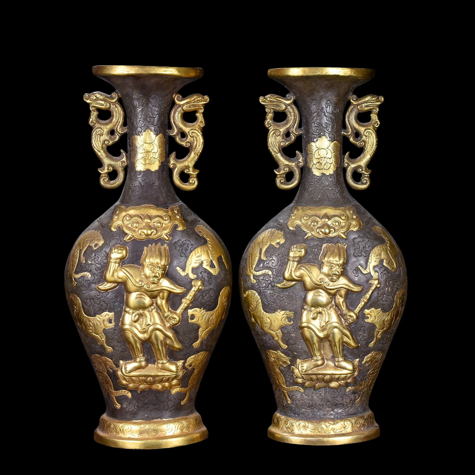 A Pair of Exquisite Gilt Figure Pattern Double-Ears Vases: A Pair of Exquisite Gilt Figure Pattern Double-Ears Vases,Qing Dynasty,China,Size:12.2inx6.3in,Weight:2200g 一对鎏金人物纹双耳瓶,中