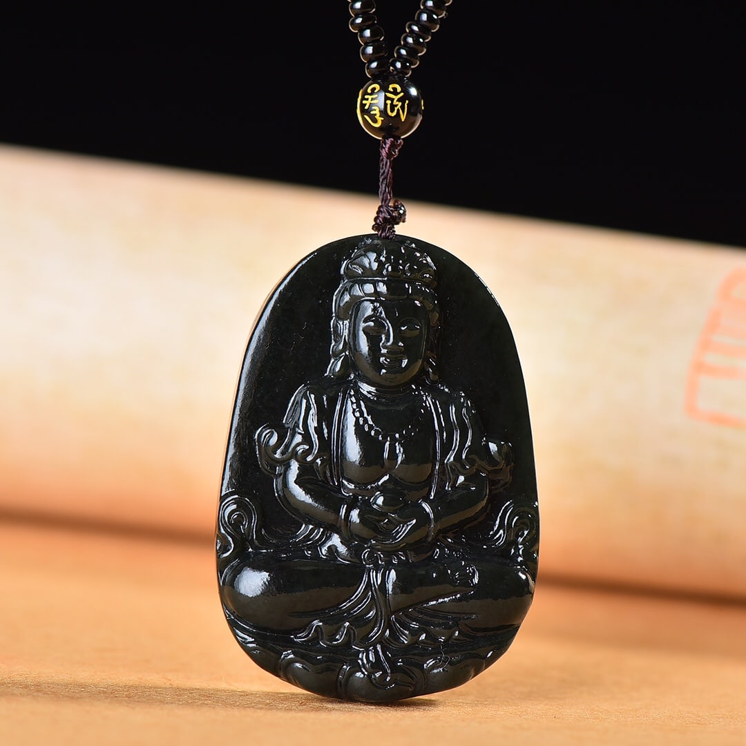 An Exquisite Sapphire Avalokitesvara Pattern Pendant: An Exquisite Sapphire Avalokitesvara Pattern Pendant,Size:37mmx53mm