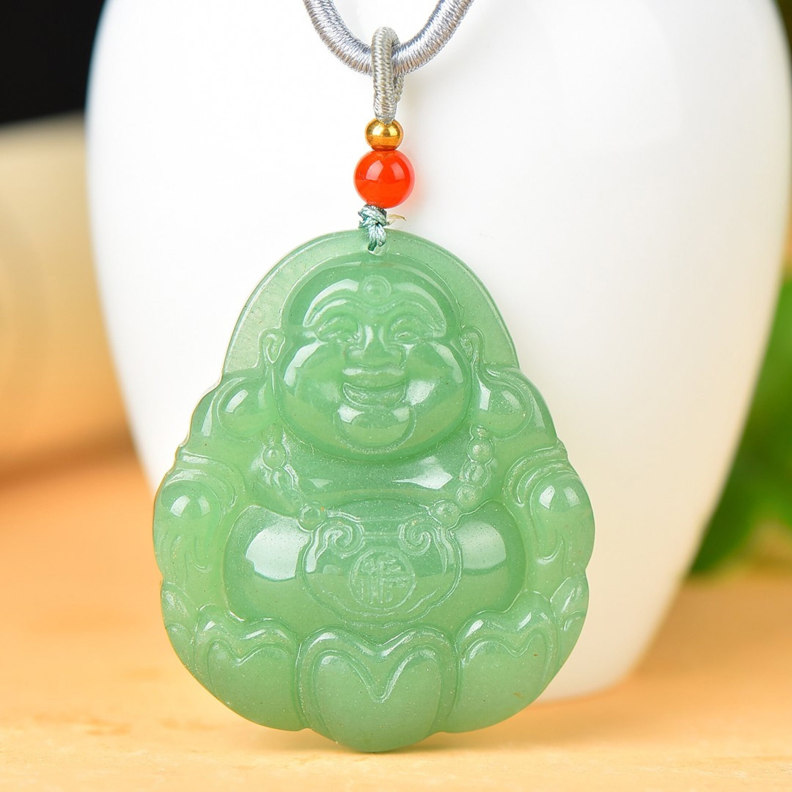An Exquisite Greenish Jade Buddha Statue Pendant: An Exquisite Greenish Jade Buddha Statue Pendant,Size:44mmx53mm 青玉佛像挂件