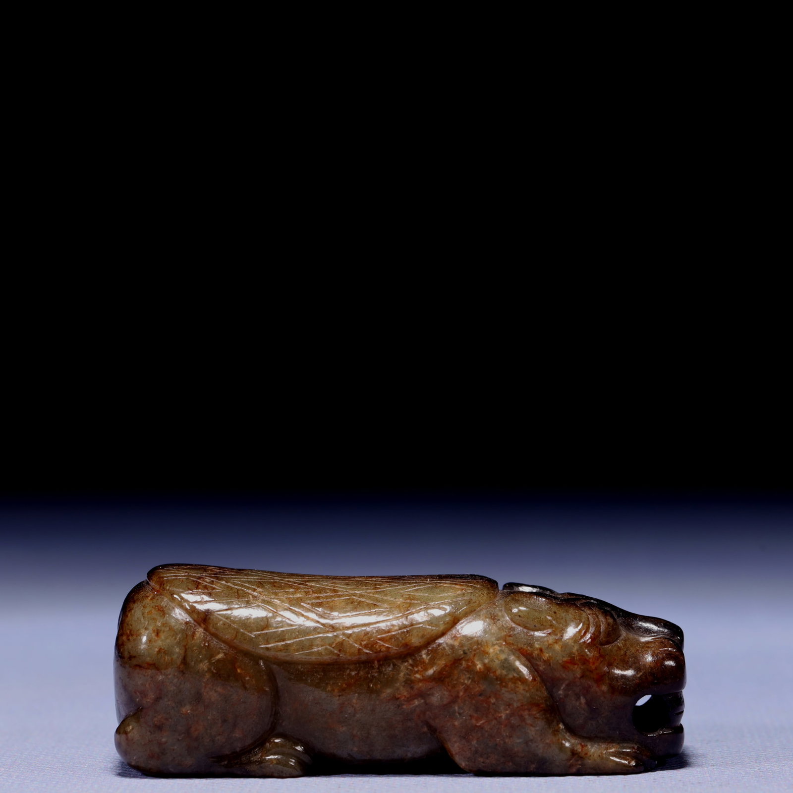 An Exquisite Archaic Jade Beast Ornament: An Exquisite Archaic Jade Beast Ornament,Ancient Time,China,Size:2.8inx1.2inx0.8in,Weight:129g 高古玉兽摆件,中国远古时期