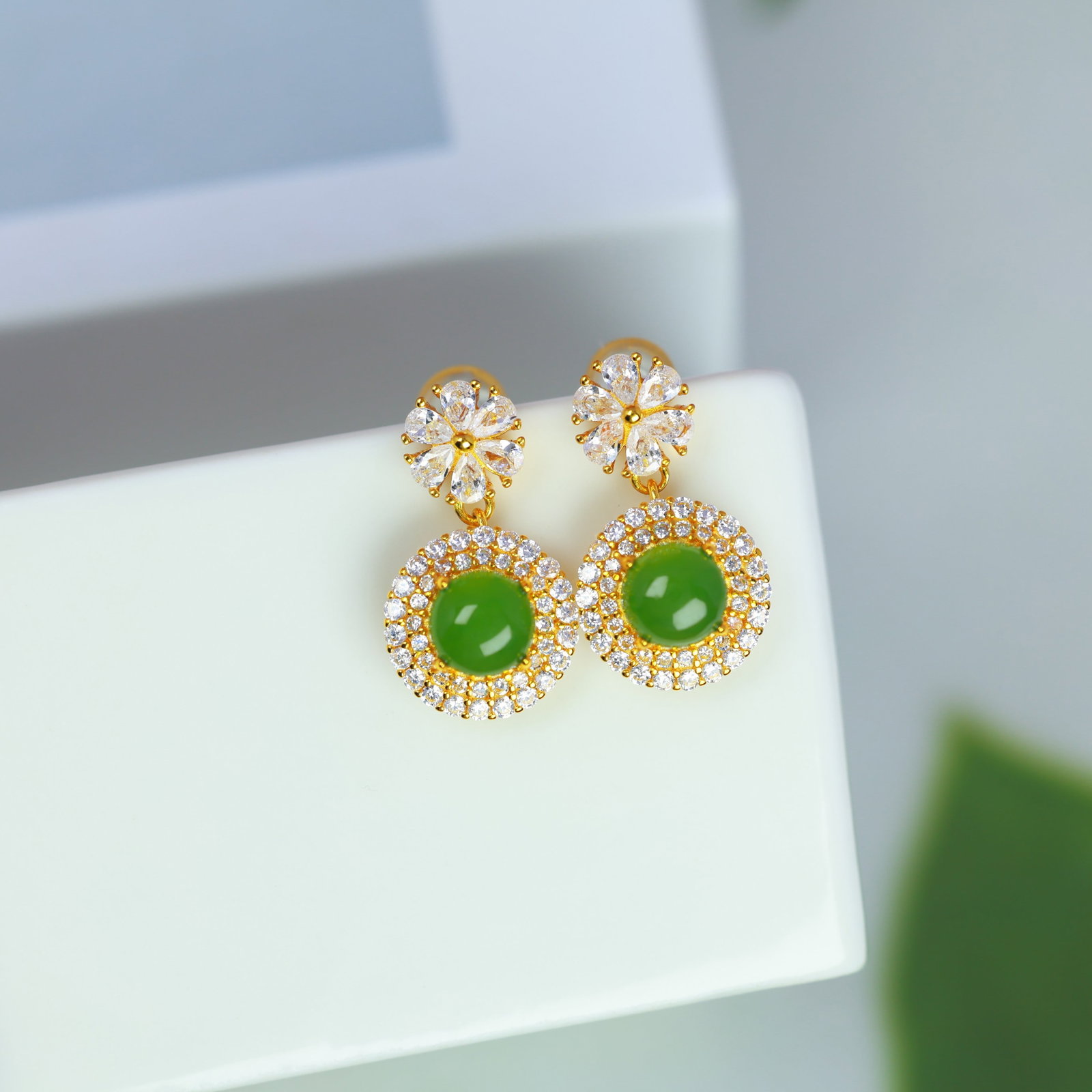 A Pair of Sterling Silver and White Jade Round Drum Face Stud Earrings (1 of 6)