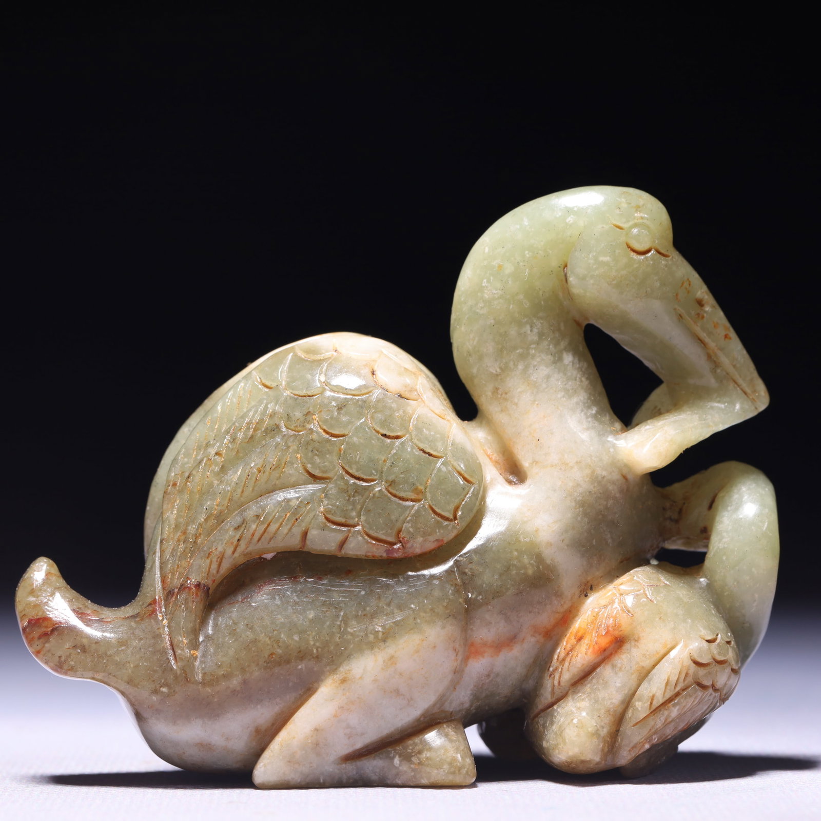 An Exquisite Green Jade Duck Ornament: An Exquisite Green Jade Duck Ornament,Qing Dynasty,China,Size:3.5inx1.4inx2.8in,Weight:239g 青玉鸭摆件,中国清代