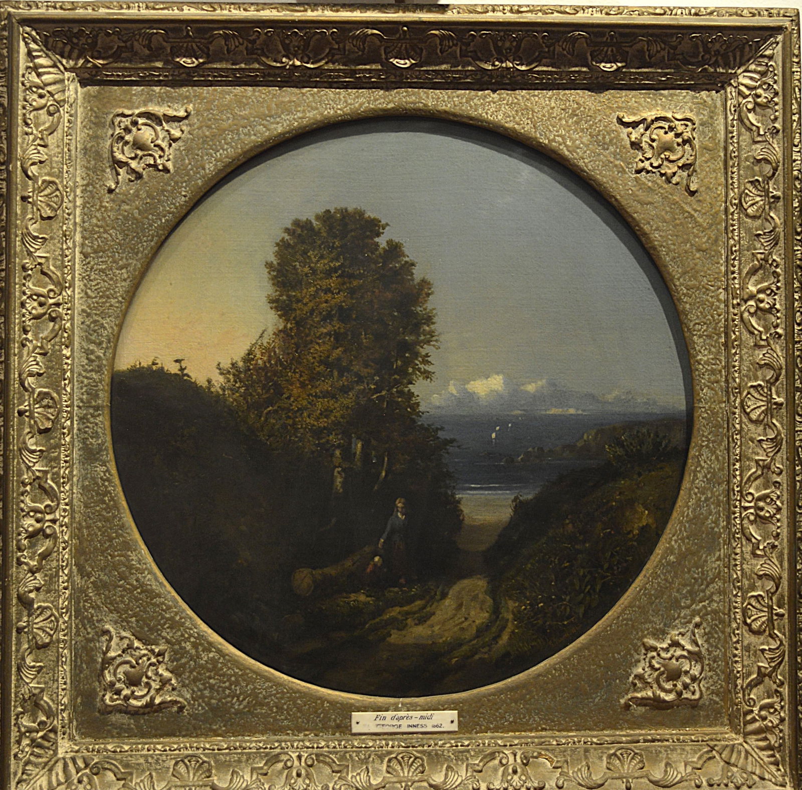 Prominent landscape painter George Inness. Round landscape on board.: Artist: George Inness (1825-1894) Date: 1862 Signature: Signed and dated lower right Materials: Round landscape on board George Inness was a prominent American landscape painter. Now recognized as one