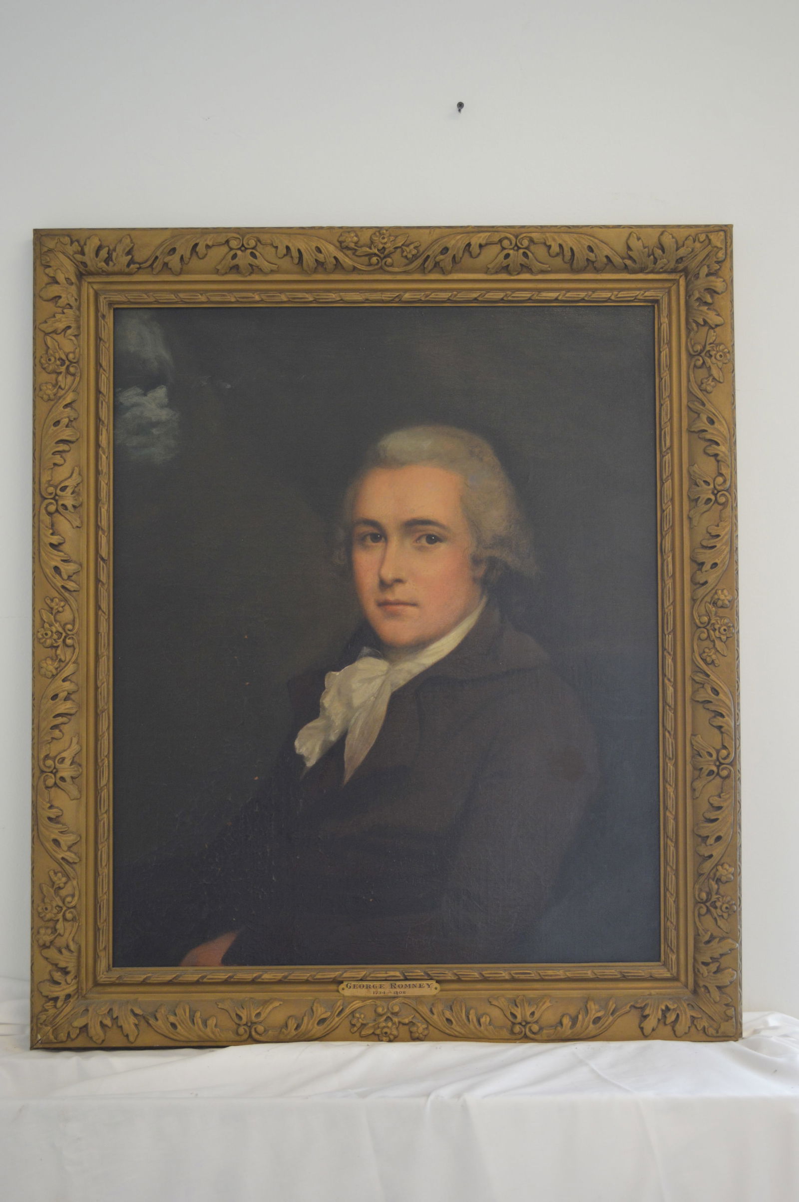 Portrait of a Gentleman: Artist information: After George Romney Materials: Oil on canvas Signature information: Unsigned Height: 29 inches Width: 24 inches