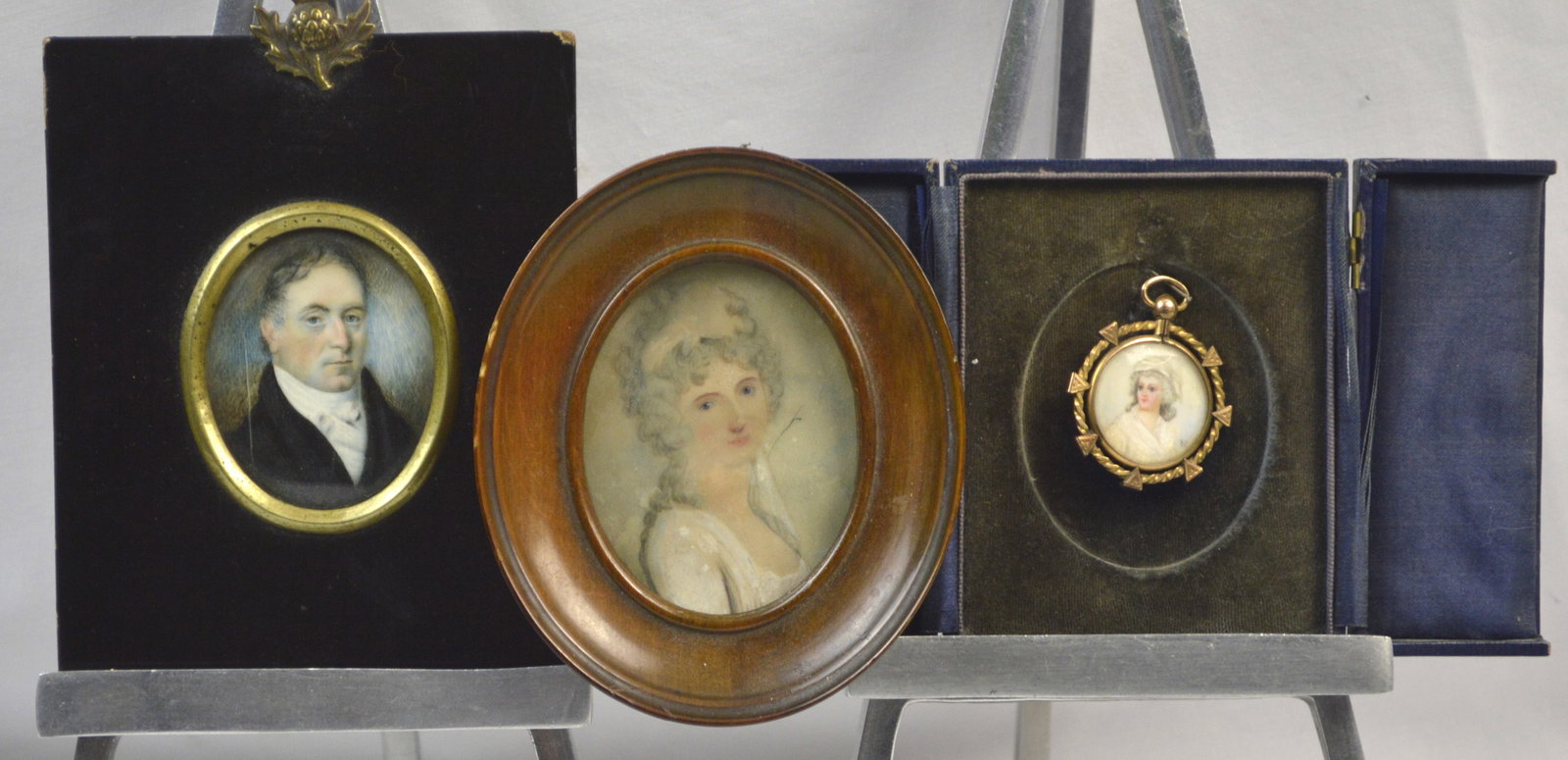 Three Antique Portrait Miniatures: Three antique portrait miniatures. Small portrait in gold filled frame.