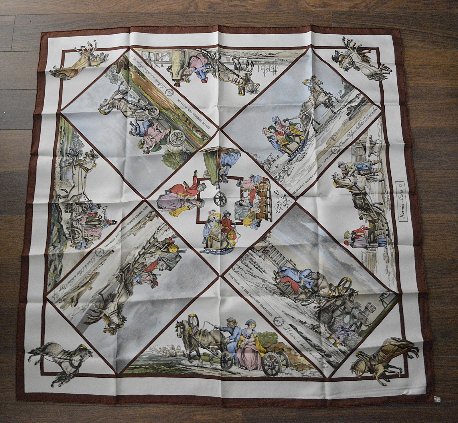 Hermes Silk Scarf in original package: Hermes silk scarf in original package Details: Depicts working horse themes Measures: 35 inches square