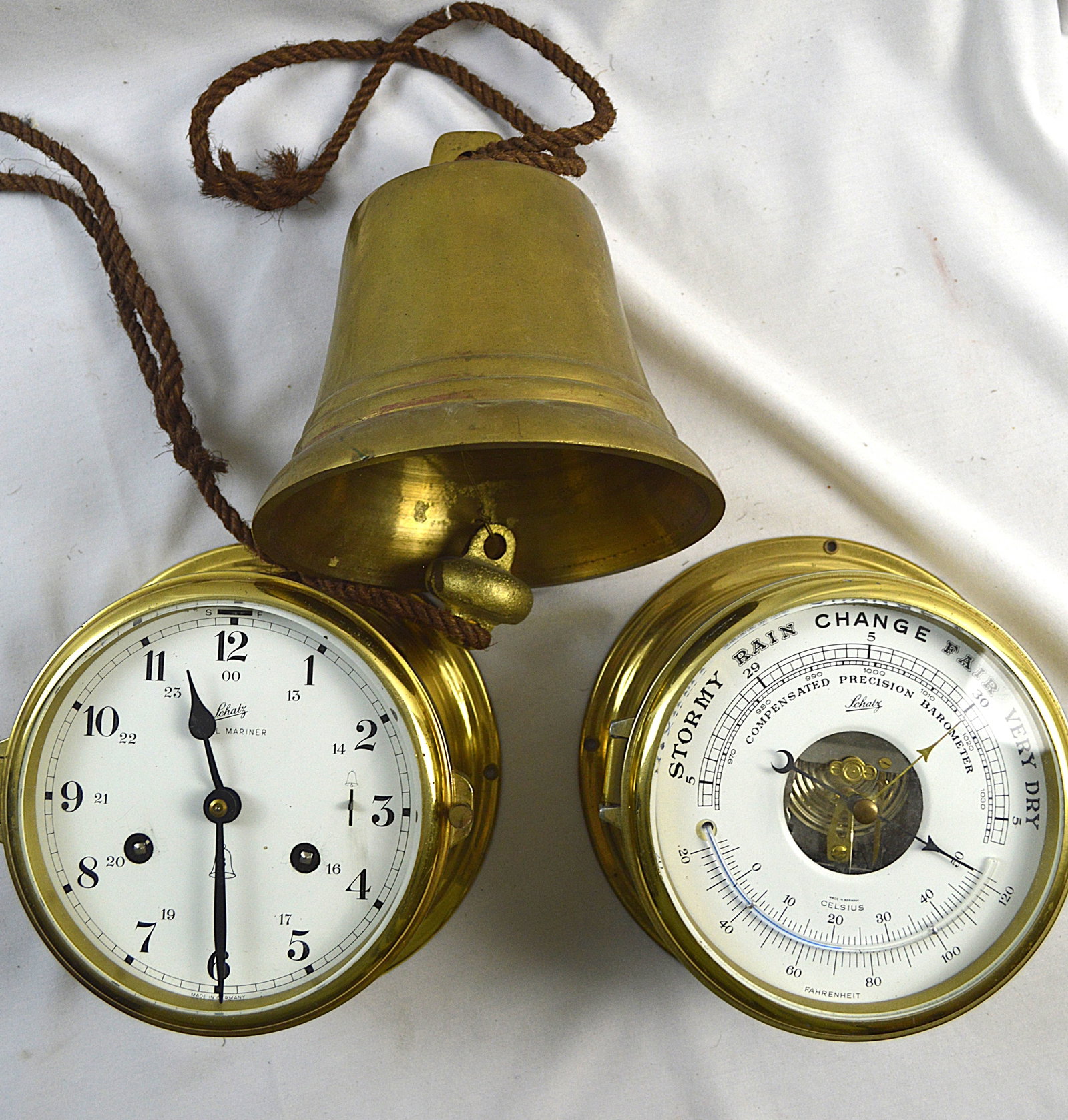 Brass Marine Set of Ships Instruments: Brass Marine Set of ships instruments. Includes: brass ships bell and brass clock and brass barometer Measures: The ships brass bell is 6.5 inches high x 6.25 inches at the base. Clock diameter is 6.2