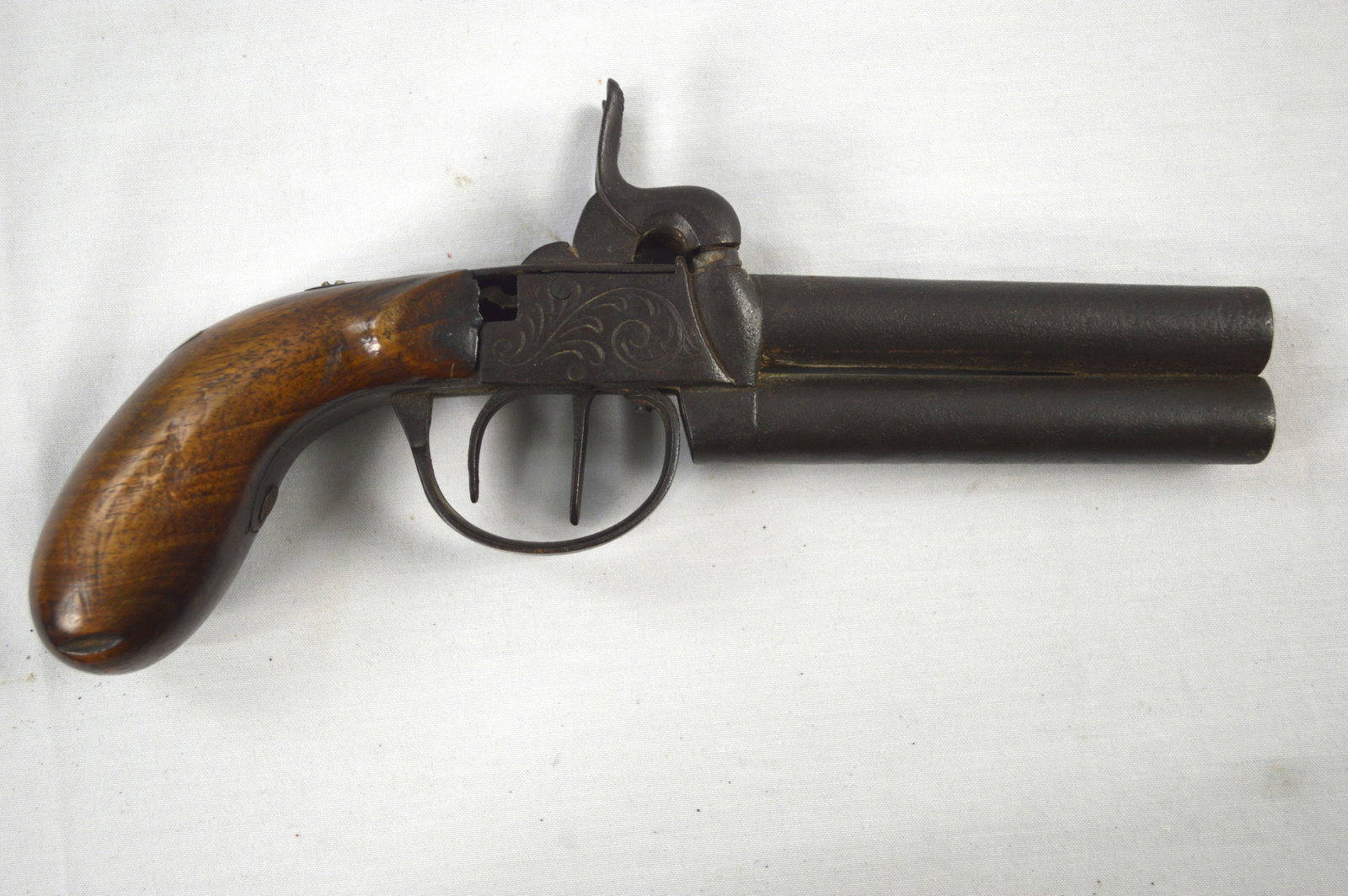 Antique Percussion Double Barrel Hand Gun: Percussion antique Handgun with a pair of over + under barrels; A FINE DOUBLE BARREL OVER & UNDER PERCUSSION TRAVALLING PISTOL, ca. 1850 overall length of the gun is 8¼ " and the barrels are ab