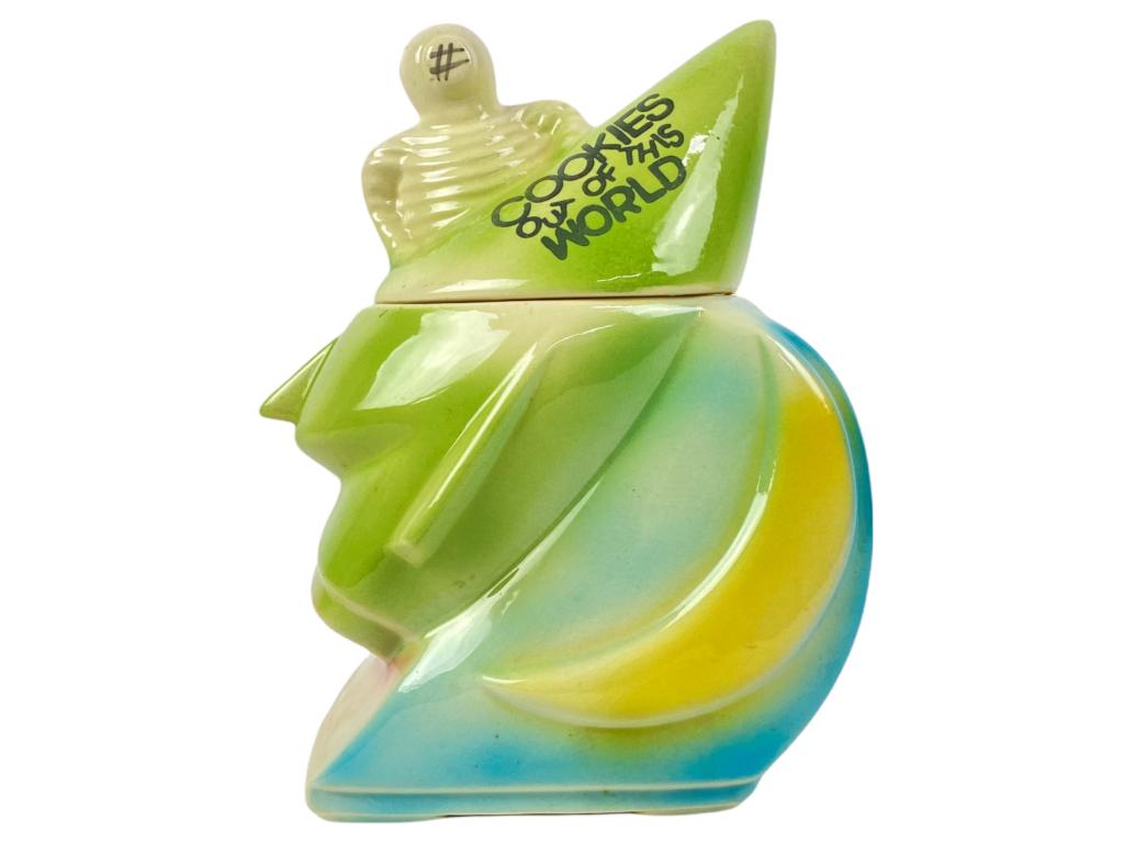 American Bisque "Cookies Out Of This World" Jar: 9.75" Tall 7.5" Wide 5.75" Depth No chips or cracks seen. Crazing throughout.