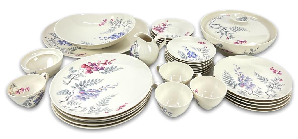 (32pc) Eva Zeisel Castleton China Wisteria Set: Marked. Lid of one piece is missing. One coffee cup has repairs to rim. Otherwise good condition no chips or cracks seen. Height of tallest piece: 5" Diameter of tallest piece: 10"