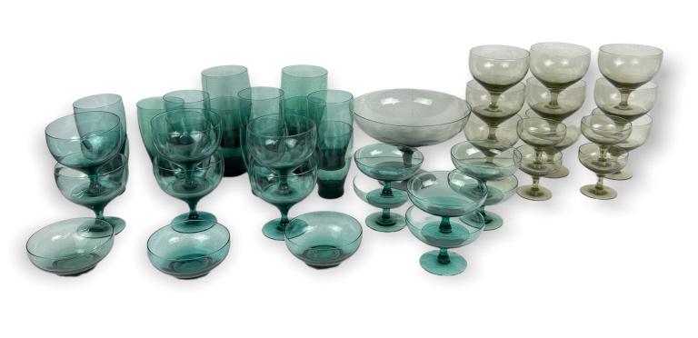 (41) Russel Wright Morgantown Collection Glasses: Most are in good condition. A few have flea bite rim chips, scratches to glass, or air bubbles. (6) Russel Wright for Morgantown, Sea Foam, Water Goblets, 4 1/8 x 3 5/8 (6) Russel Wright for Morgantow