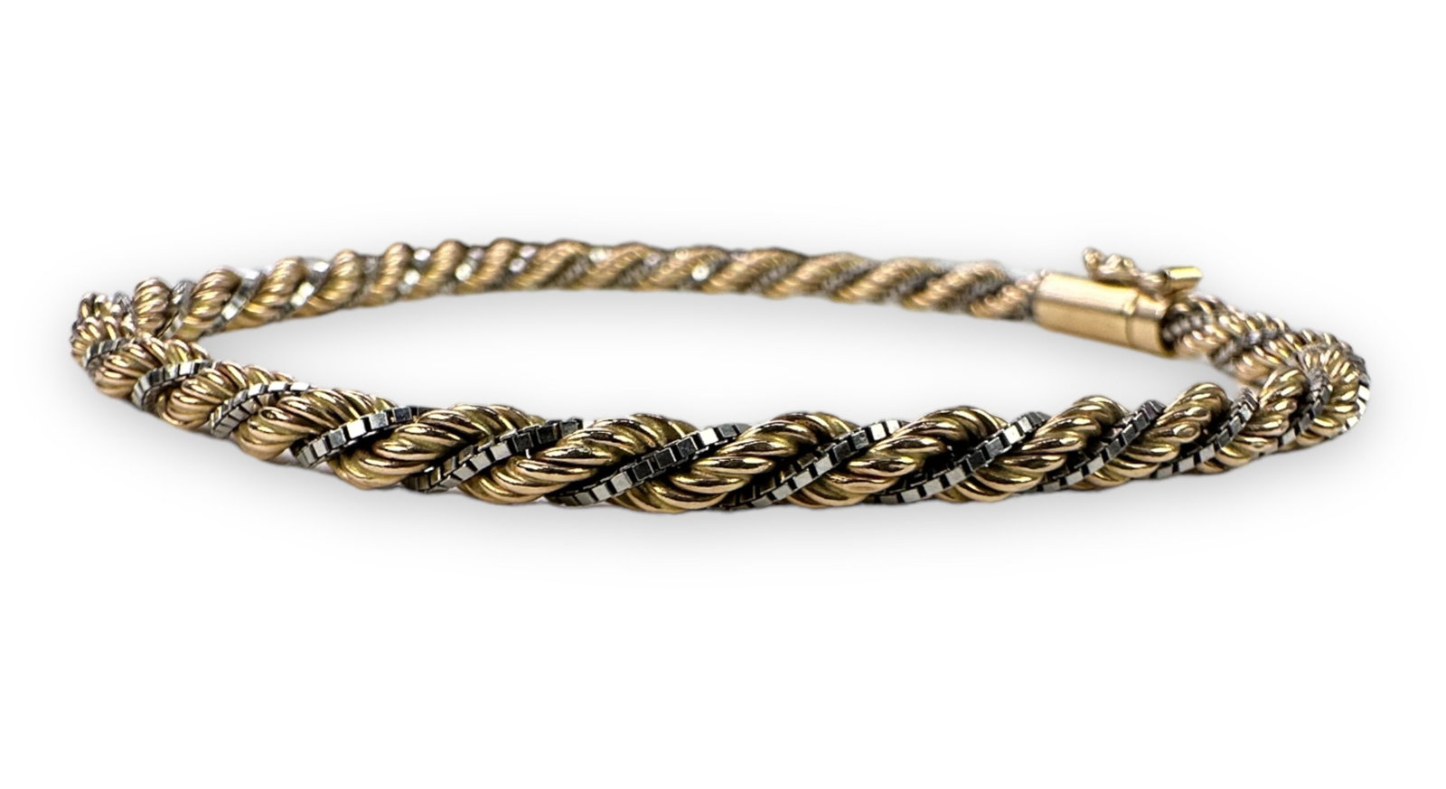 14K Yellow & White Gold Twist Rope Bracelet: Weight: 7.2g Length: 8 1/4" long Condition: Bracelet is in very good condition.