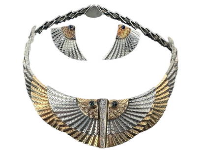 Erte "Nile" Gold & Silver Necklace & Earring Set: Limited Edition 13/250. Set with Diamond & Sapphire. 14K Gold & Sterling. The necklace is 16" in length & 1.5? width at the widest point. Condition: Very good; light wear consistent with use.