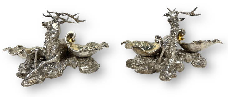 (2) John Samuel Hunt Sterling Stag Salt Cellars: Size: Each measures 4" tall x 7" long x 4 1/4" wide Condition: Very Good Artist Bio: John Samuel Hunt was one half of the renowned 19th-century jewelry firm, Hunt & Roskell, which catered to aristocra