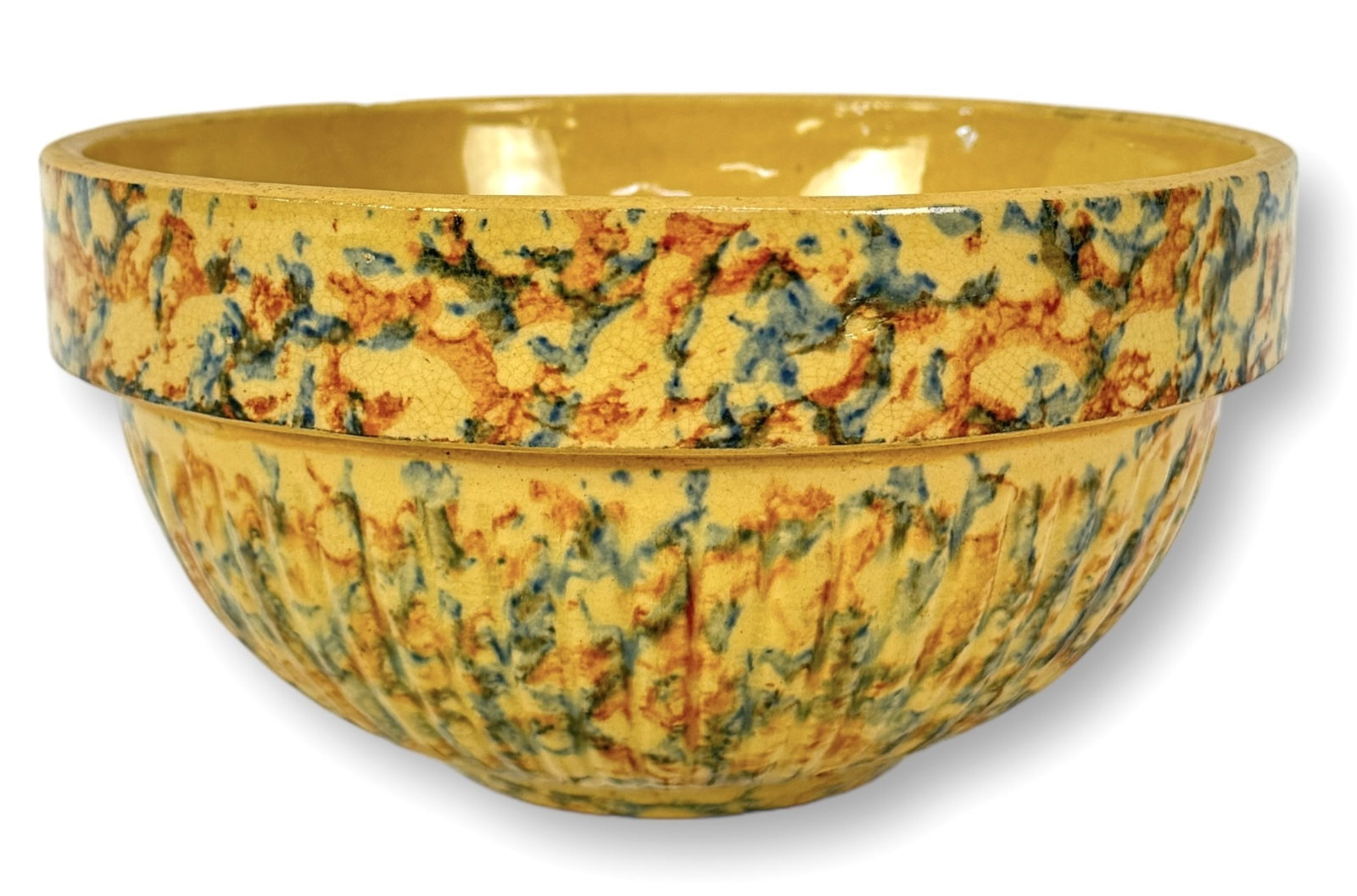 Red Wing Sponged Saffron Ware Iowa Bowl: Size: 4" tall x 7 3/4" across Condition: Very good. No chips or cracks.