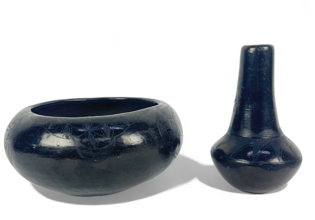 Santa Domingo Pueblo Blackware Bowl & Vase: Vase height: 6 1/2" Bowl Diameter: 8 1/4" Condition: Some loss to finish seen on the neck of the vase. Bowl shows some minor loss as well especially near the base.