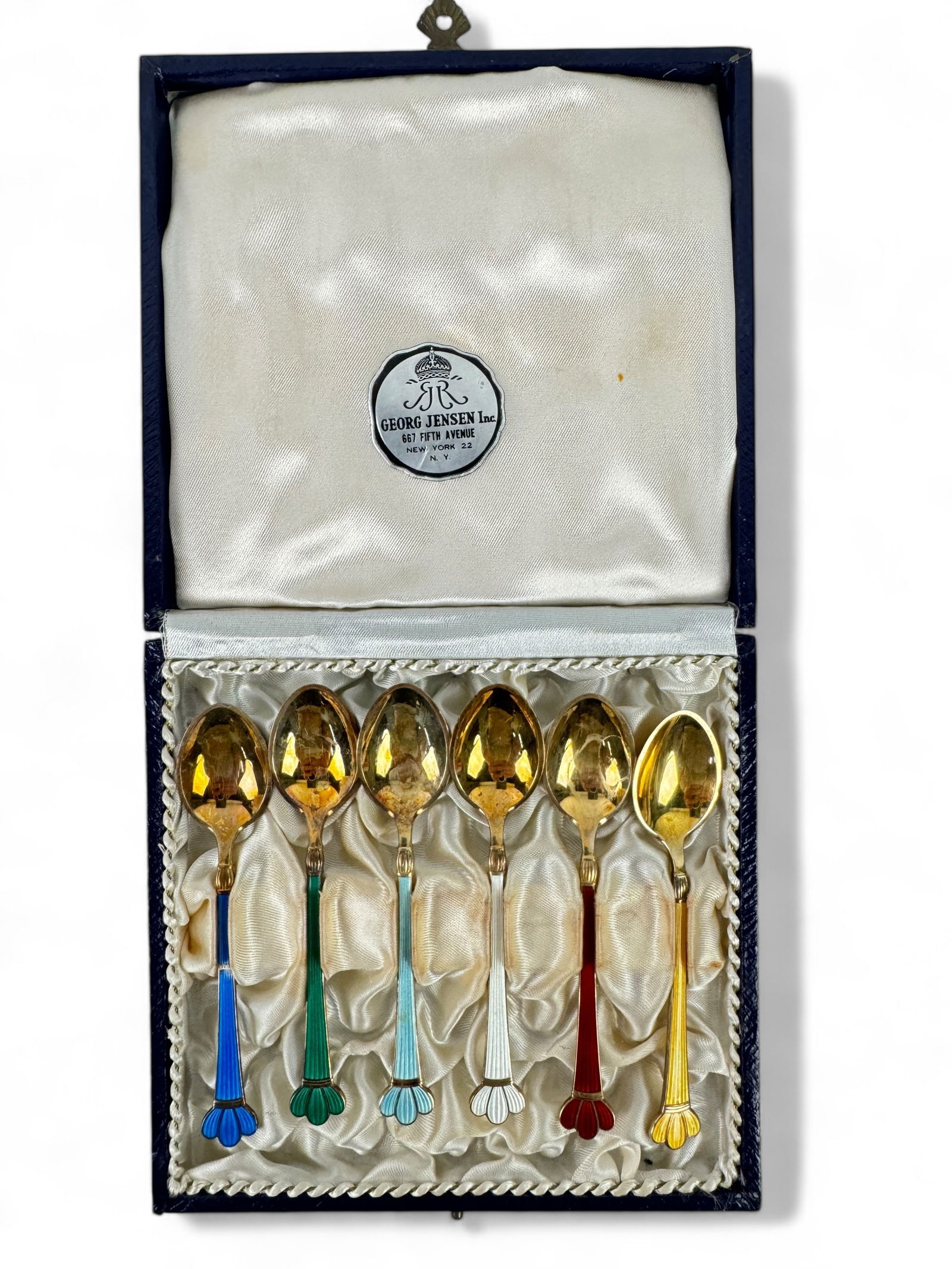 (6) George Jensen Sterling Sterling Enameled: Vermeiled Demitasse Spoons In Original Box Each spoon measures 3 3/4" long Condition: Very good with light surface scratching consistent with gentle use.